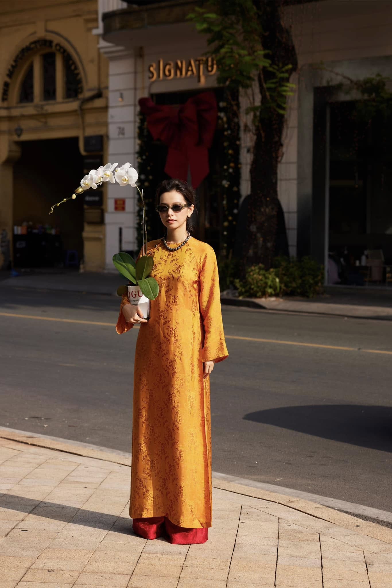 Full length Imperial Ember golden áo dài with coordinating crimson pants from Mộc - complete luxury Vietnamese outfit