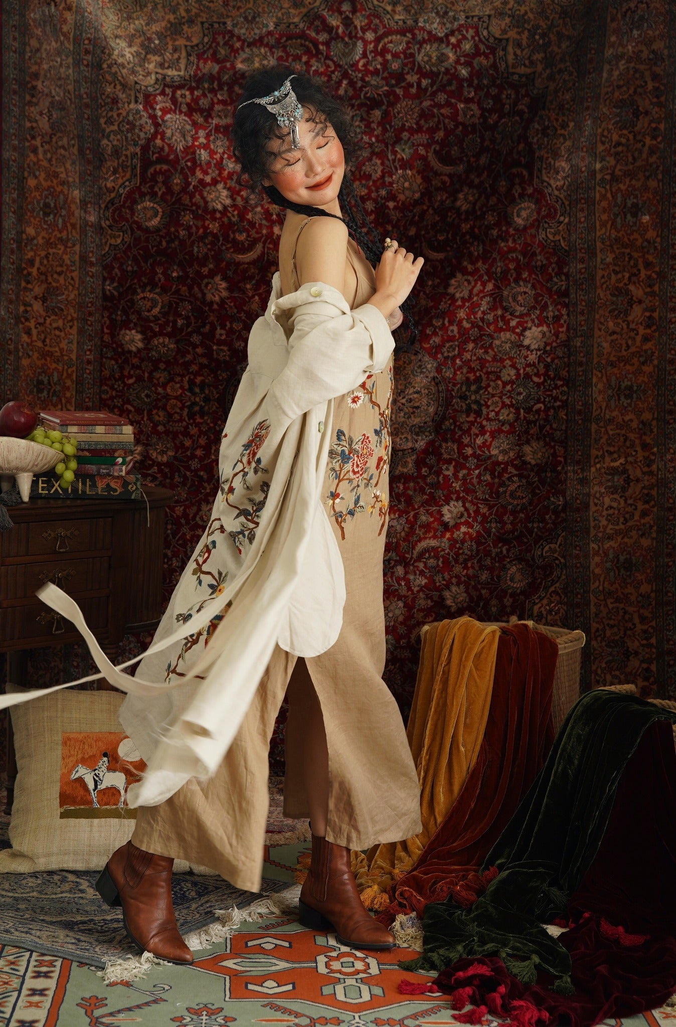 "Song bird" embroidered linen dress in beige by Huulala, featuring red floral artisan design.