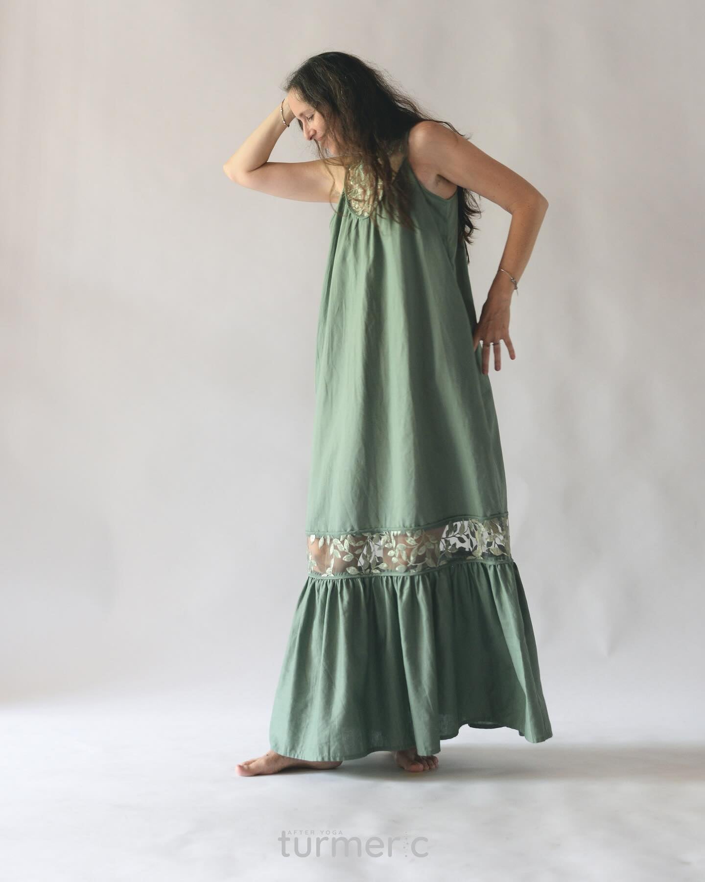 "Magnolia - Linen and Lace Maxi Dress in White by Turmeric, featuring green linen fabric with floral lace accents, sleeveless design."