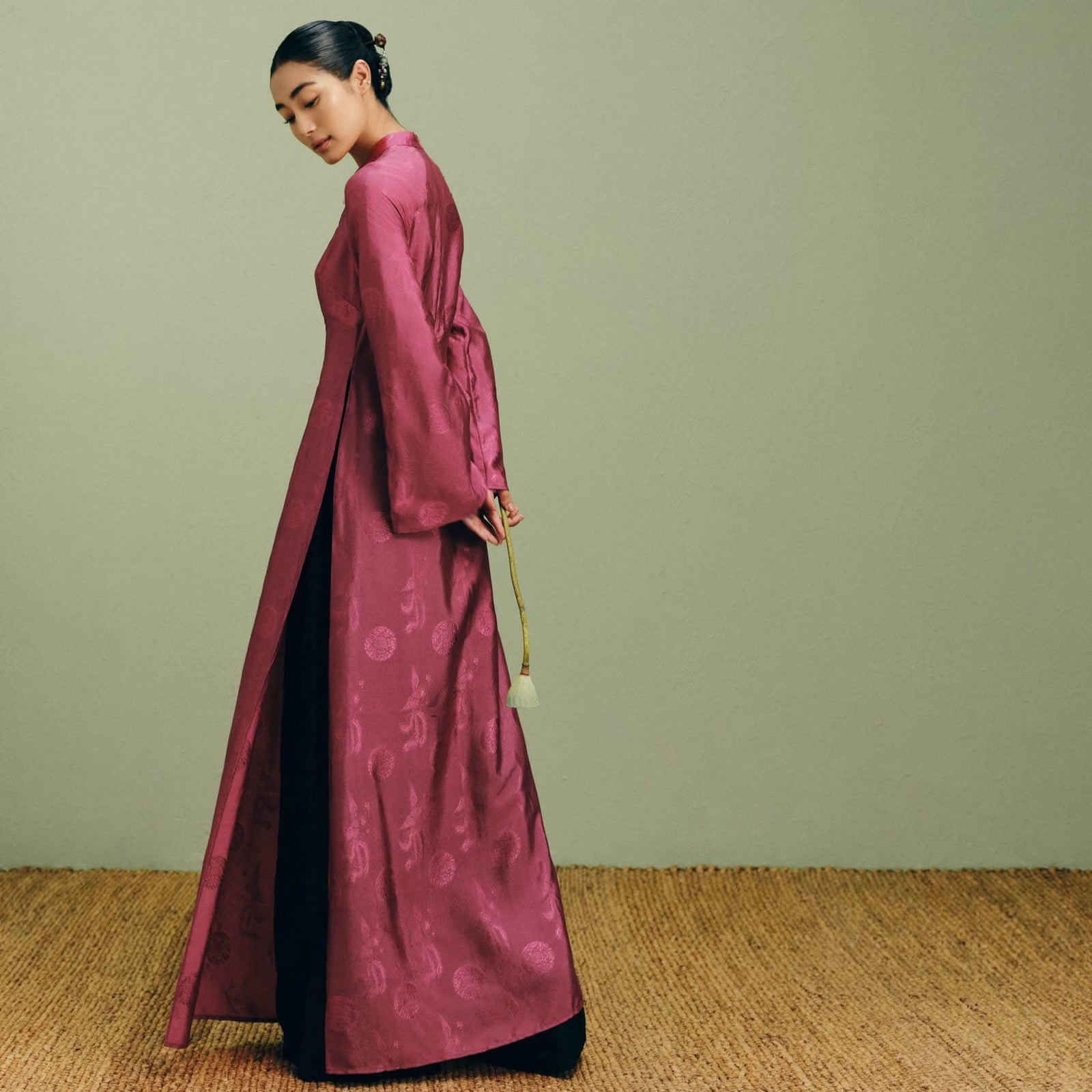 Vietnamese Ao Dai - Phuong Cac - Royal Jacquard Silk Áo Dài in Deep Dark Magenta - side profile in pink by Nam Phuong Y