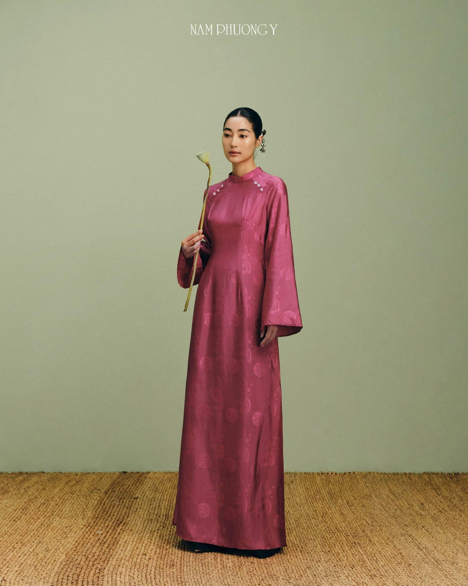 Phuong Cac - Royal Jacquard Silk Áo Dài in Deep Dark Magenta - front view by Nam Phuong Y