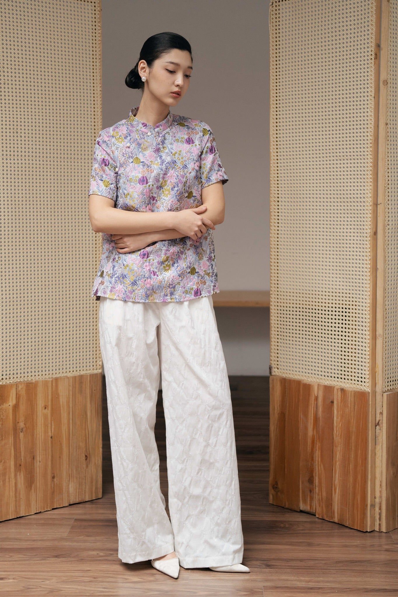 "Hoa Vien Mandarin-neck top in pastel purple/pink silk jacquard with floral pattern, Vietnamese cultural design by Hy Phuong."