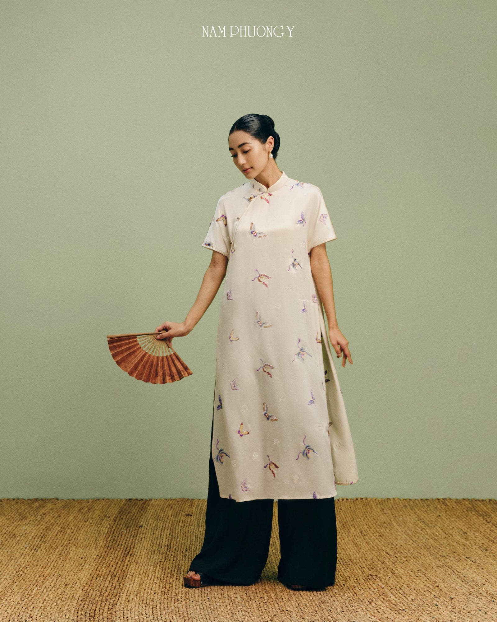 Vietnamese Ao Dai - Tú Điệp - Premium Short-sleeve Embroidered Áo Dài Set in Ivory Silk - front view in beige by Nam Phuong Y
