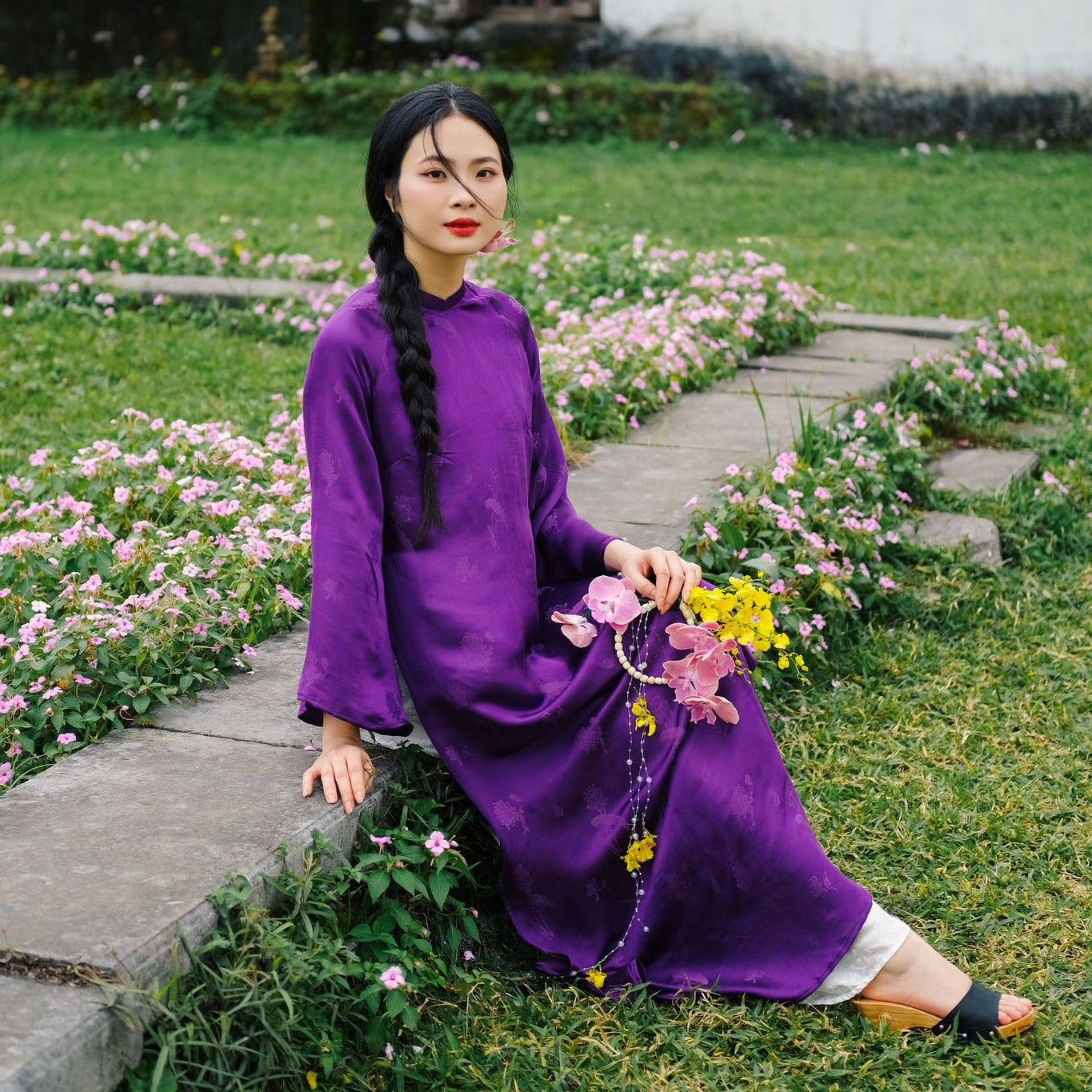 "Traditional Vietnamese Ao dai in purple silkworm silk, artisan woven, modern design."