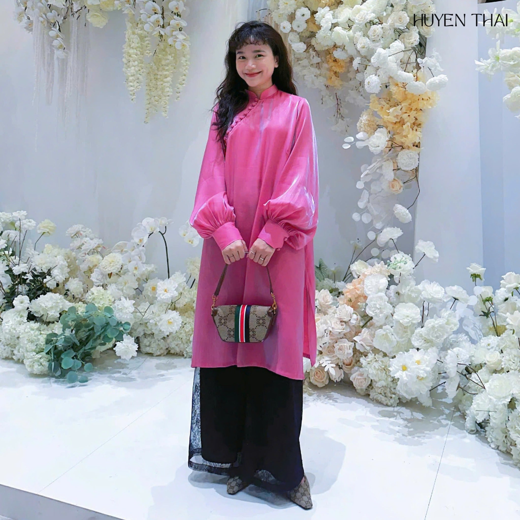 "Man Man Ao-Dai Set in pink wormsilk by Huyen Collection, traditional Vietnamese dress with artisan craftsmanship."
