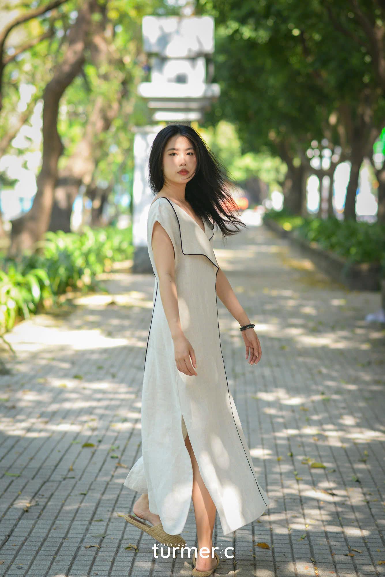 “Rosa” Linen Maxi Dress in Cream by Turmeric, modern pattern, sleeveless, elegant summer style.