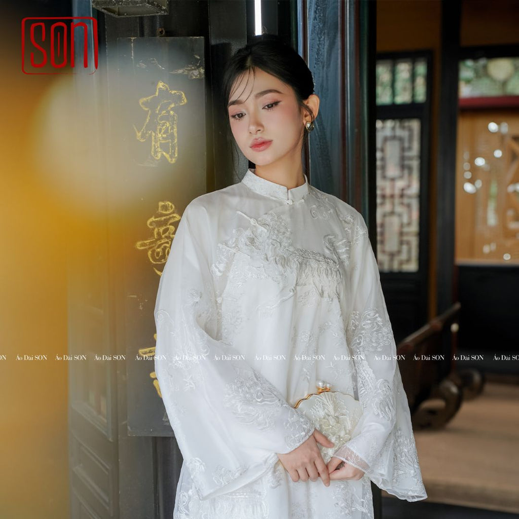 "Uyen Son" white embroidered organza Ao Dai set, traditional Vietnamese wedding dress with floral silk design.
