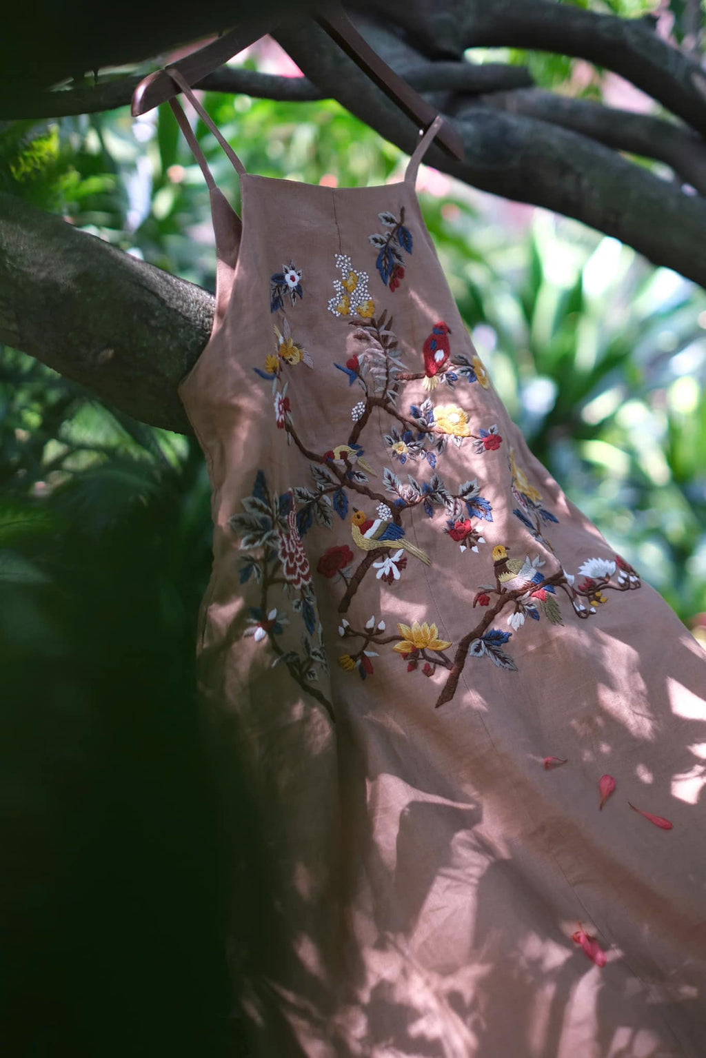 "Song bird" embroidered linen dress in beige with red floral artisan design by Huulala.