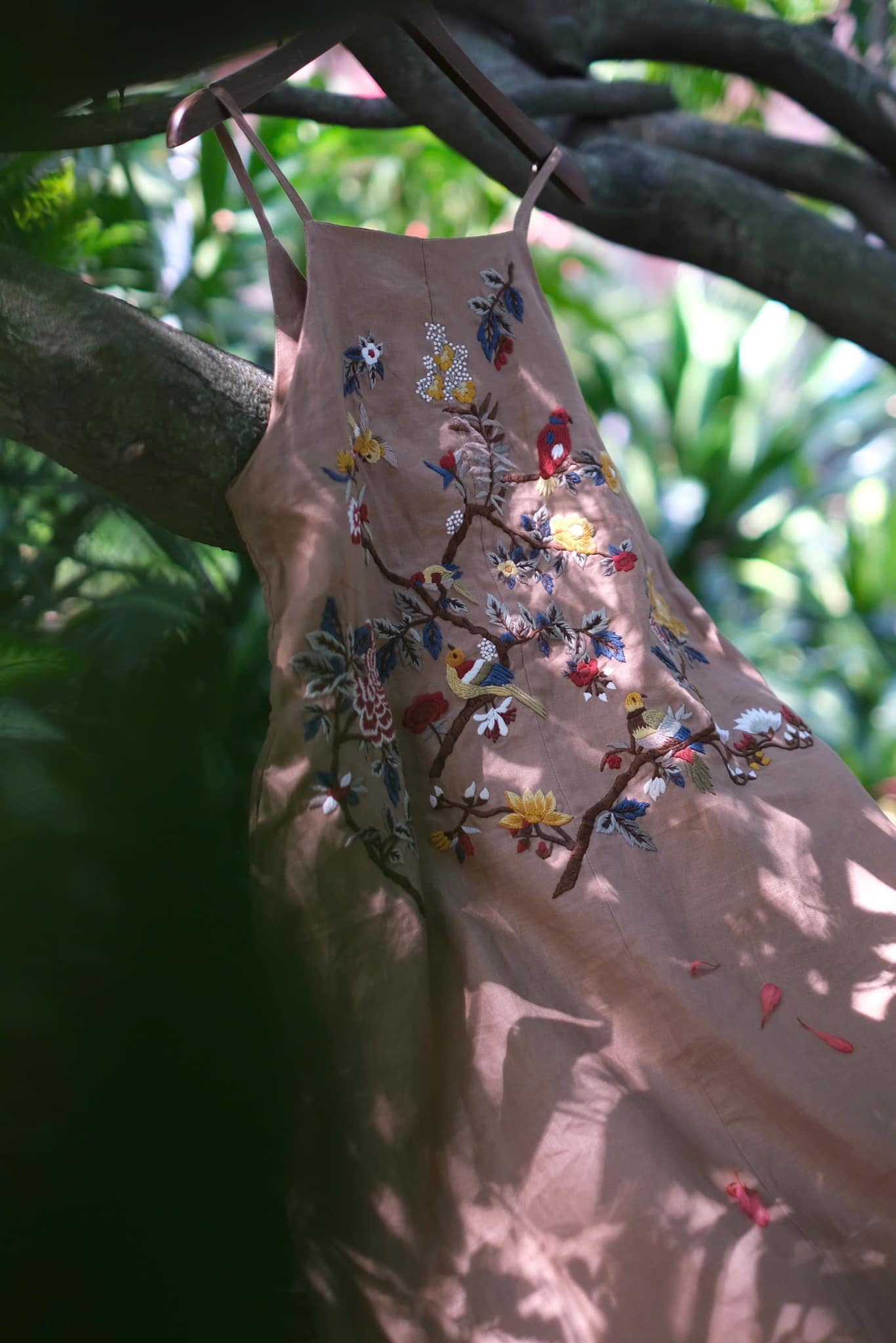 "Song bird" embroidered linen dress in beige with red floral artisan design by Huulala.
