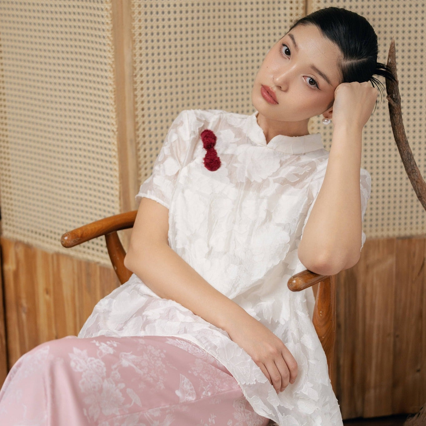 Vietnamese Ao Dai - Lam Khue – Jacquard Silk Mandarin-Neck Top in Pastel Pink - styled presentation in white by Hy Phuong