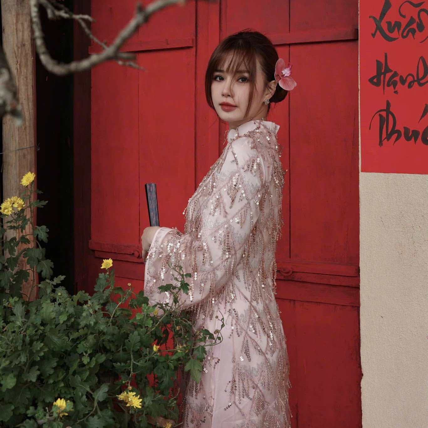"Thuoc Son" sequined Ao Dai in blush pink silk, traditional Vietnamese dress.