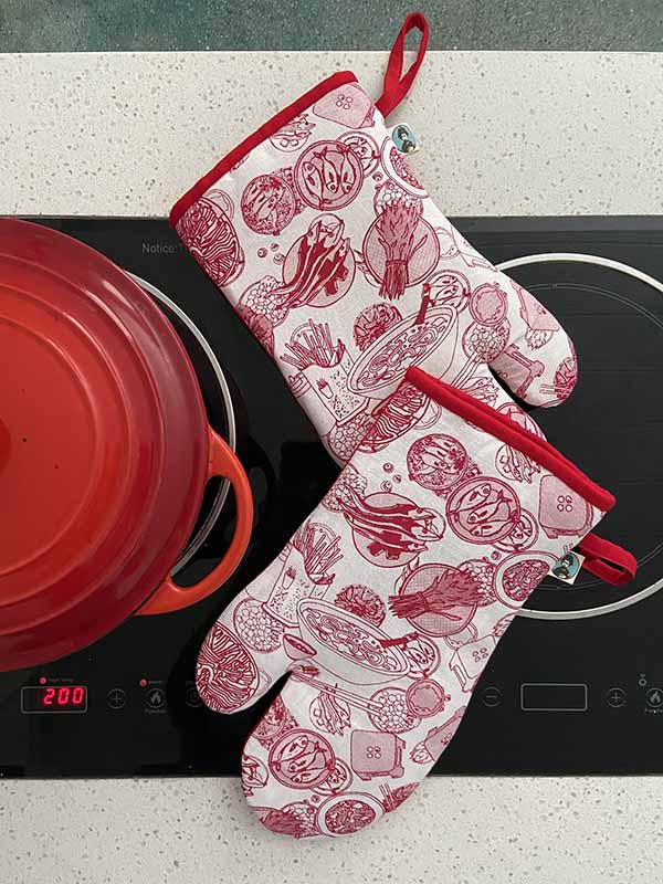 "Vietnam in a Bowl" kitchen towel with red Vietnamese food illustrations, Bat-trang design.