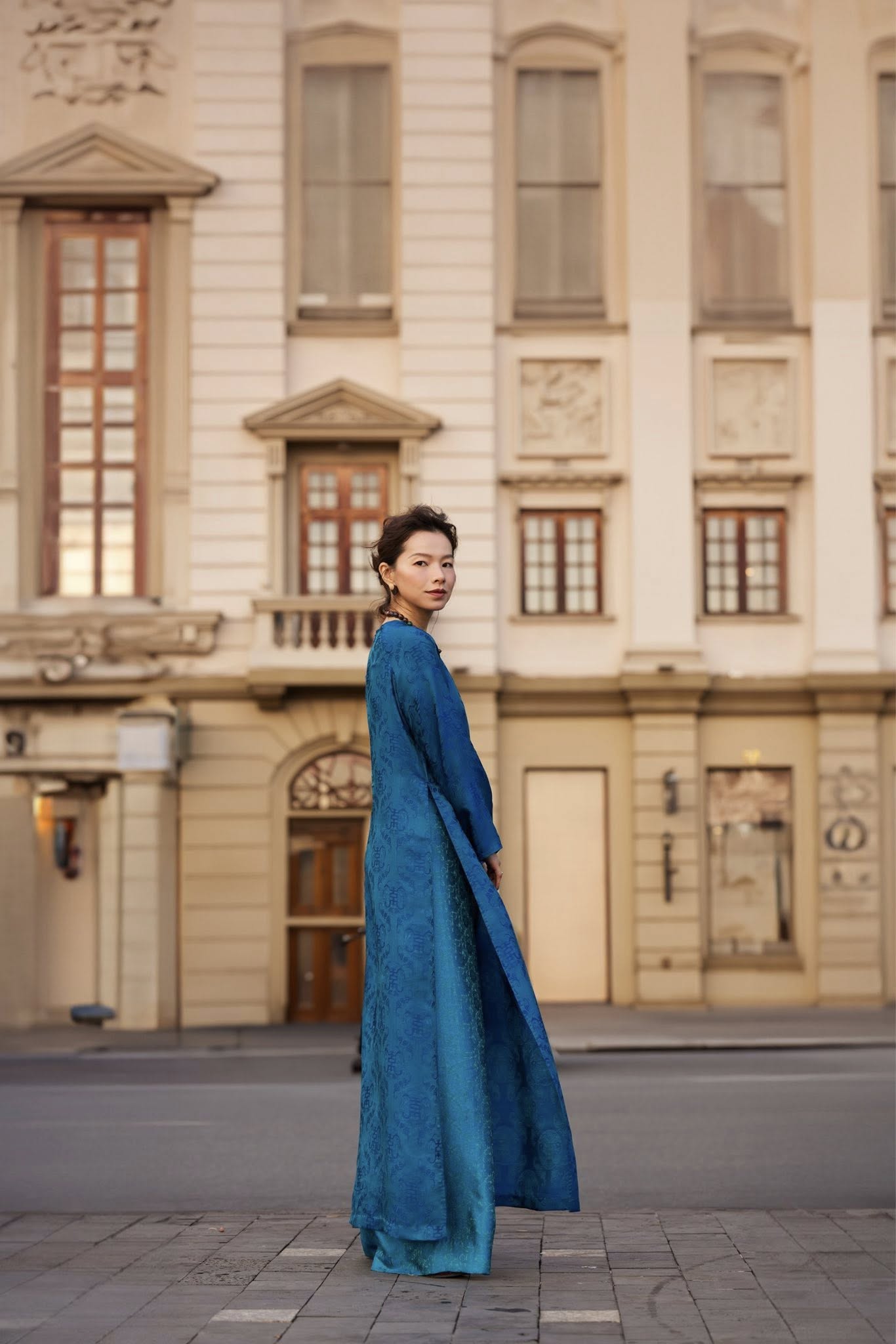 Vietnamese Ao Dai - “Celestial Indigo” - Luxury Wormsilk Ao Dai Set in Imperial Teal - side profile in blue by Lo Boutique
