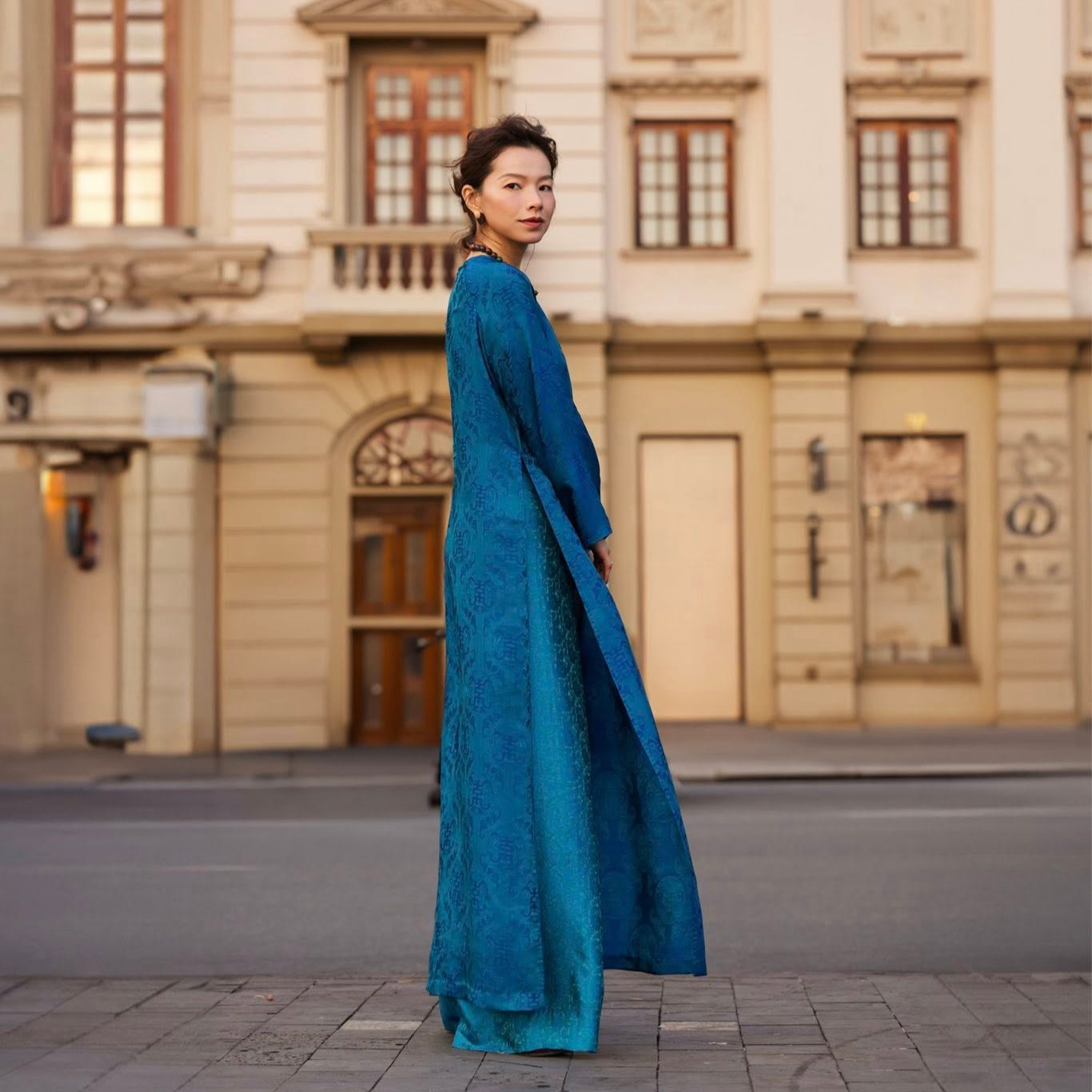 Vietnamese Ao Dai - “Celestial Indigo” - Luxury Wormsilk Ao Dai Set in Imperial Teal - side profile in blue by Lo Boutique