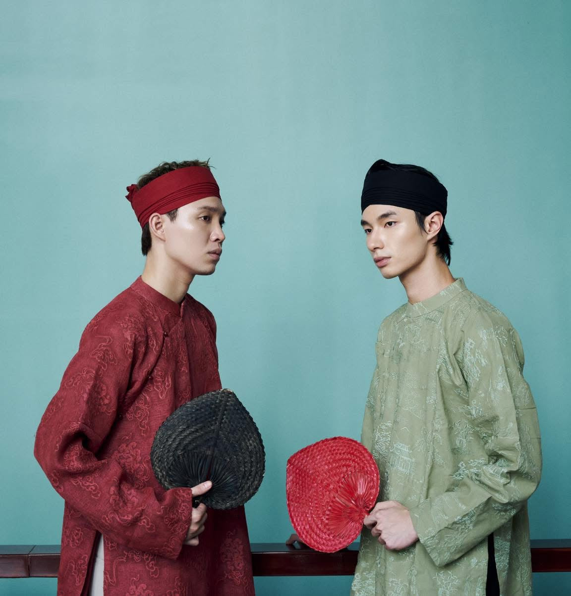 Vietnamese Ao Dai - TAM PHƯƠNG – Men’s Hand-Embroidered Linen Áo Dài - side profile in brocade in red by Maison LONG