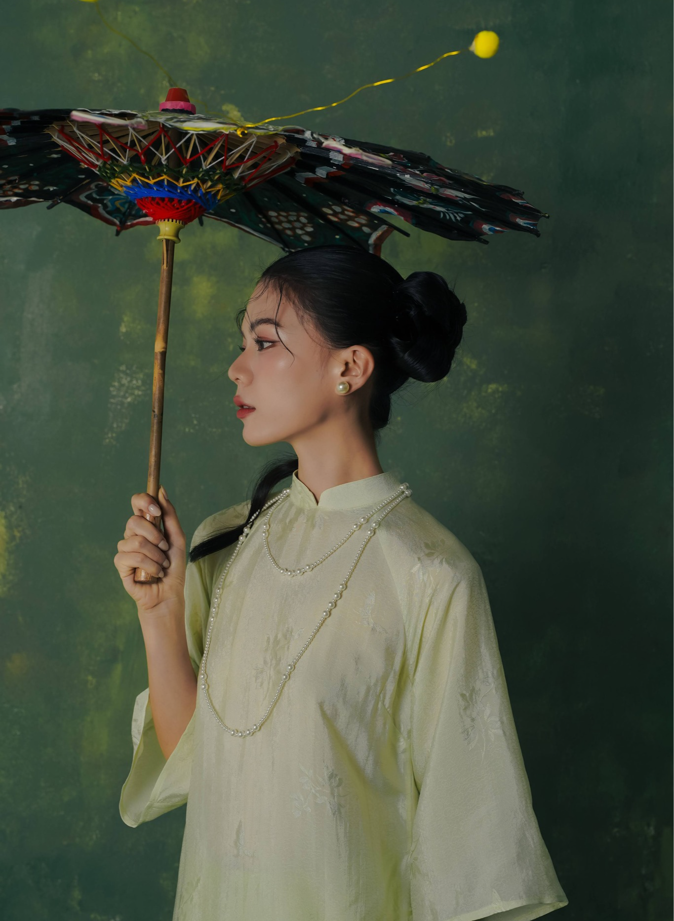 Vietnamese Ao Dai - Lan Ngoc Ao dai Set - Premium wormsilk in Light Avocado - side profile in light yellow by Lalin