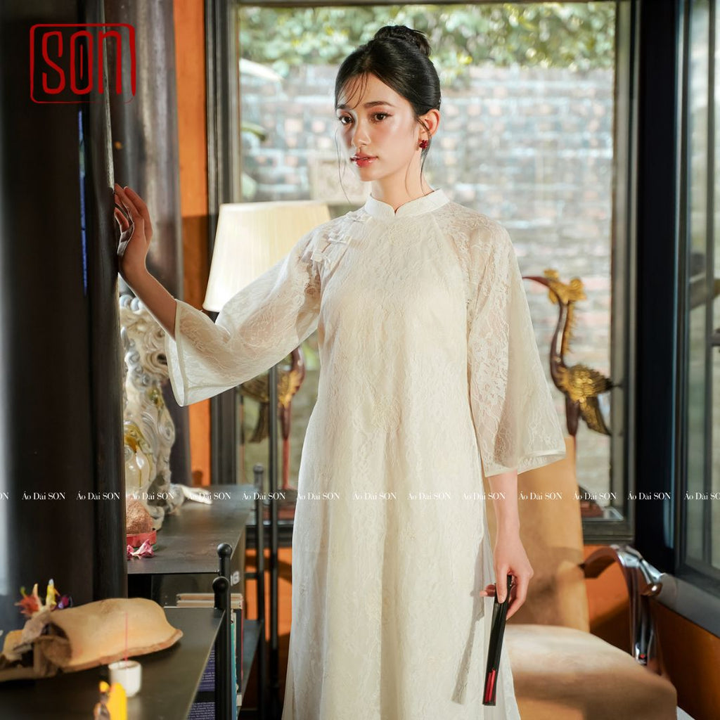 "To Son - Lacy Ao Dai set in white jacquard, traditional Vietnamese wedding dress."