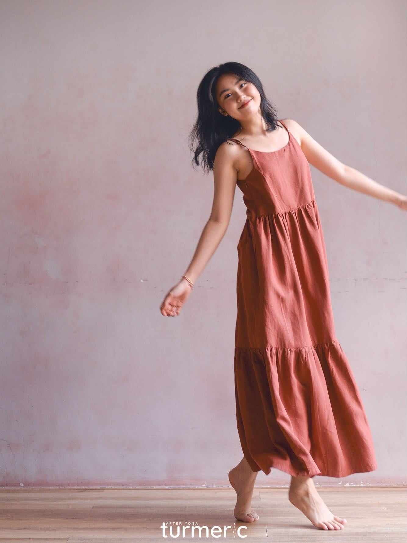 "Grace Maxi - Premium Linen dress in brick red by Turmeric, sleeveless, flowing design"