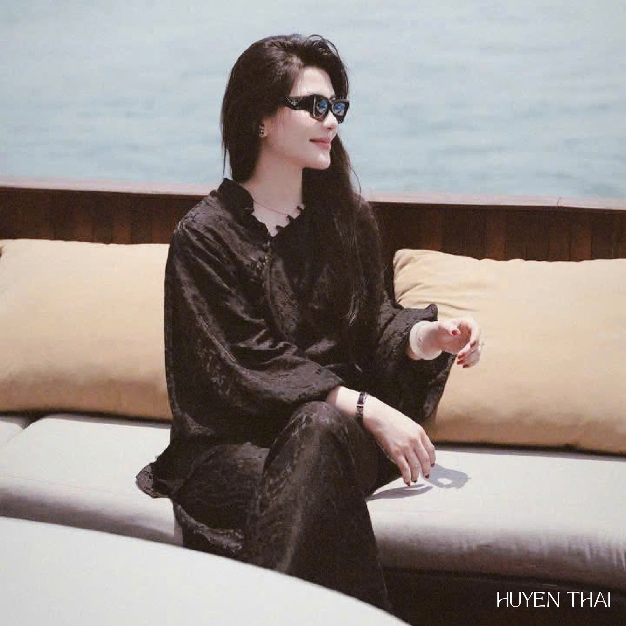 "KY Ao-Ngan black silk Ao dai by Huyen Collection, modern Vietnamese design"