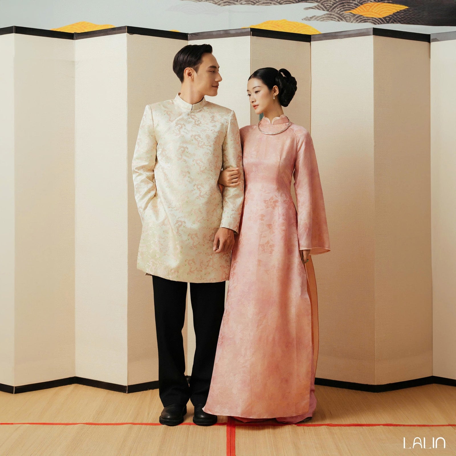 Vietnamese Ao Dai - Giao Vy Ao Dai for Men - Beige Silk Brocade with Dragon Pattern - styled presentation in pink by Lalin