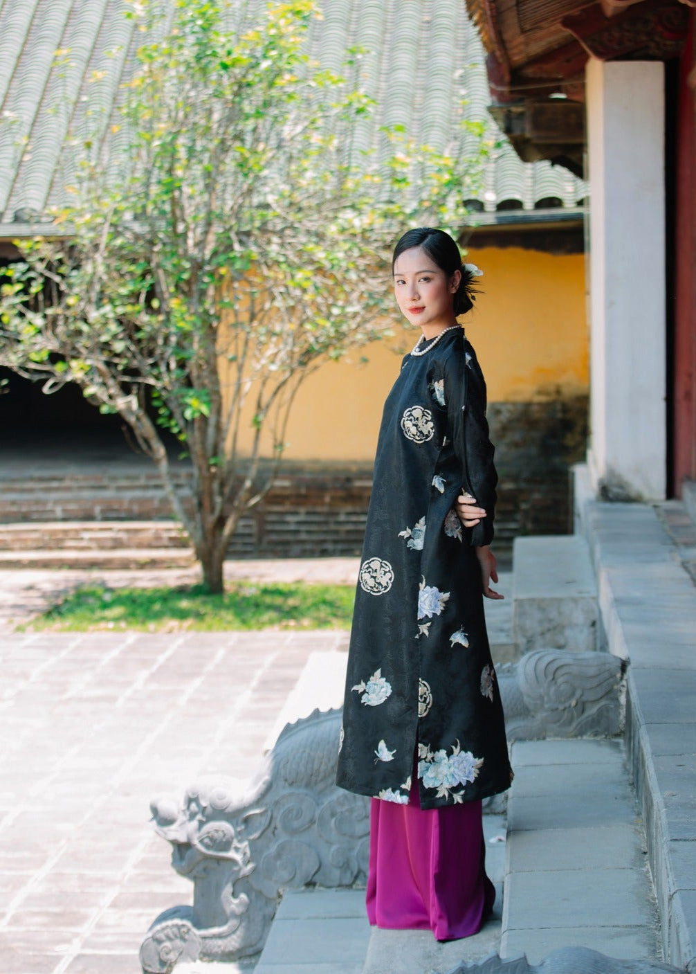 "Traditional Vietnamese Ao dai set in black viscose with floral embroidery by Moc"
