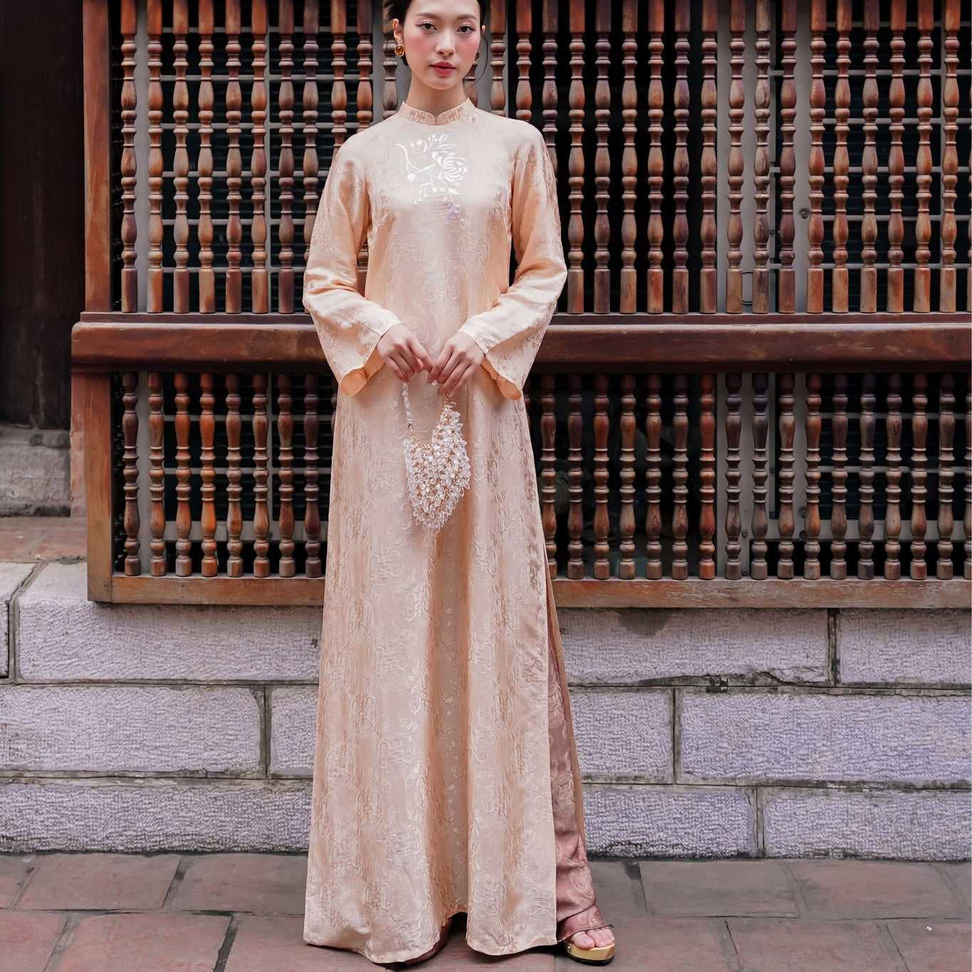 Vietnamese Ao Dai - Khanh Chi Ao Dai Set - Embroidery on wormsilk in Peach Sand - front view in peach by Tam