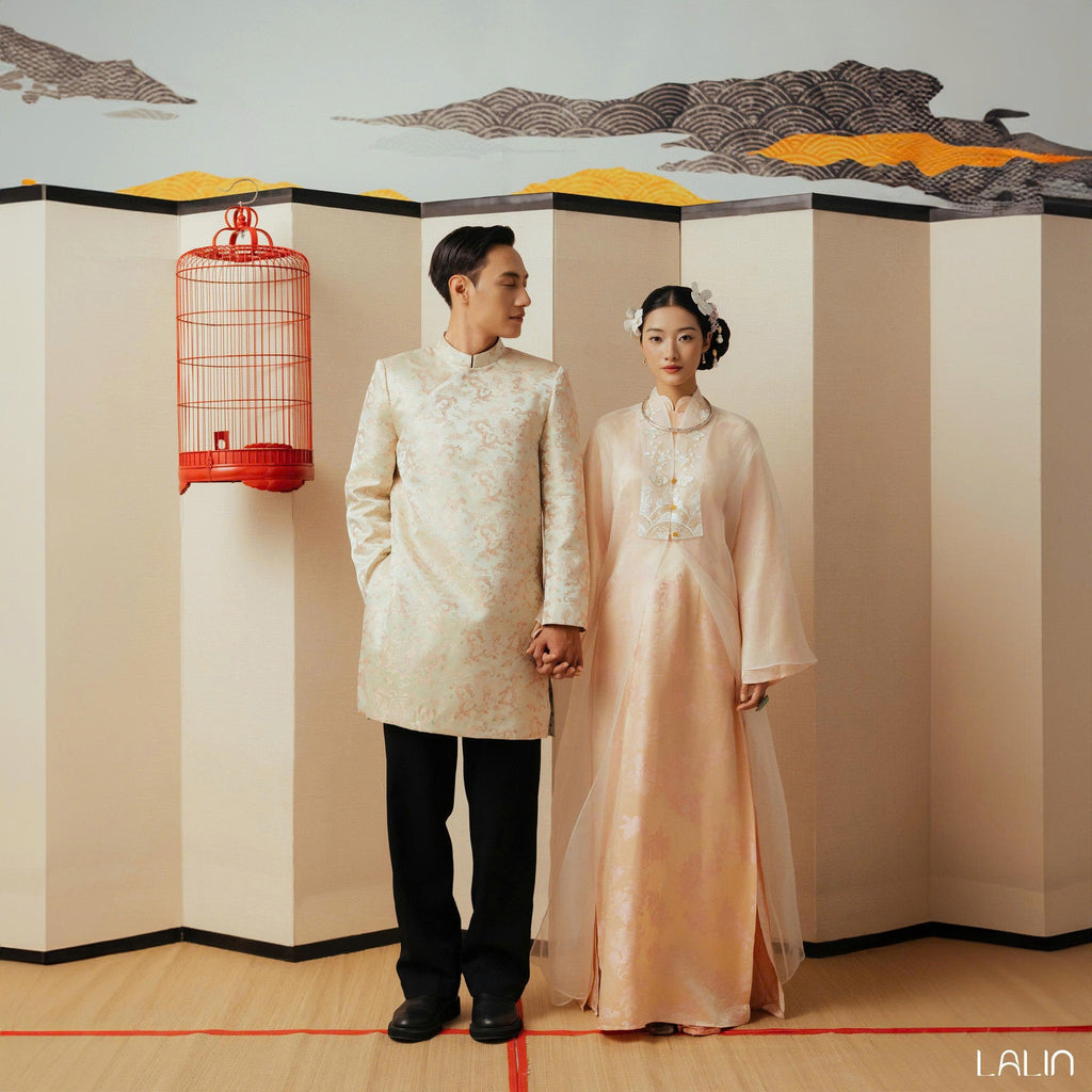 Vietnamese Ao Dai - Giao Vy Ao Dai for Men - Beige Silk Brocade with Dragon Pattern - styled presentation in peach by Lalin