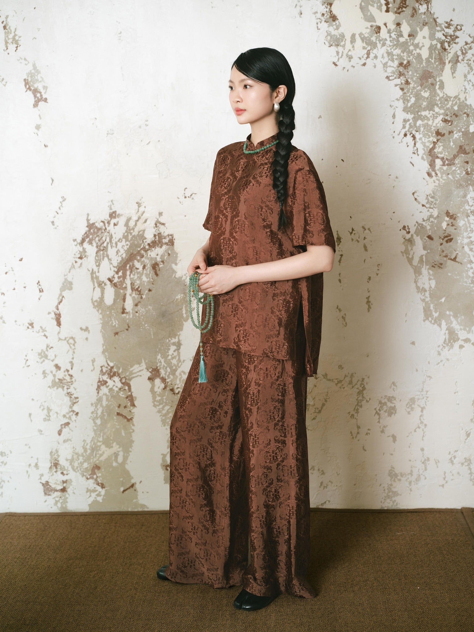 Vietnamese Ao Dai - Ninh Van Set - Mandarin-neck Wormsilk in Earth Brown - side profile in brocade in brown by Hy Phuong