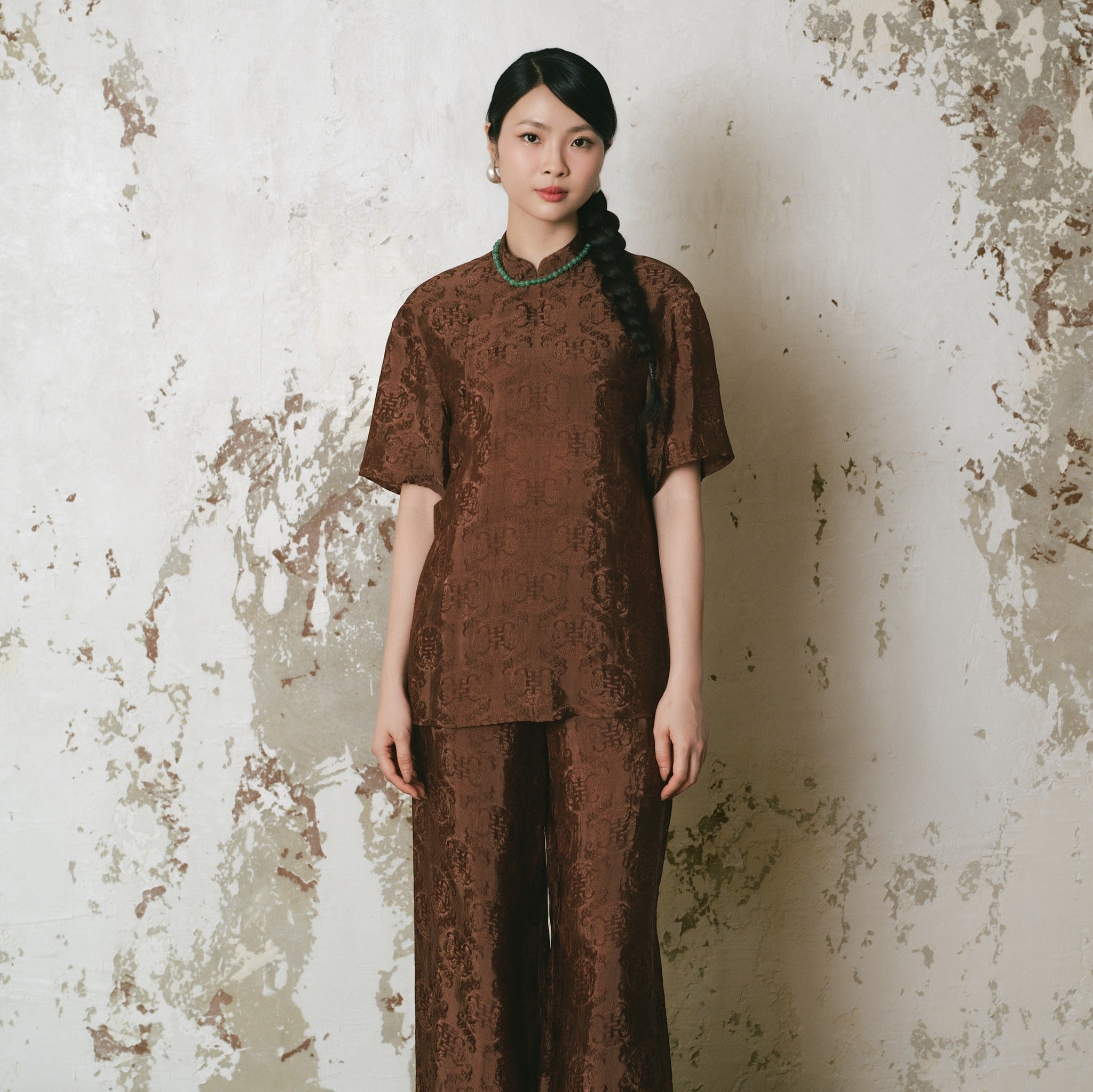 Vietnamese Ao Dai - Ninh Van Set - Mandarin-neck Wormsilk in Earth Brown - front view in brocade in brown by Hy Phuong