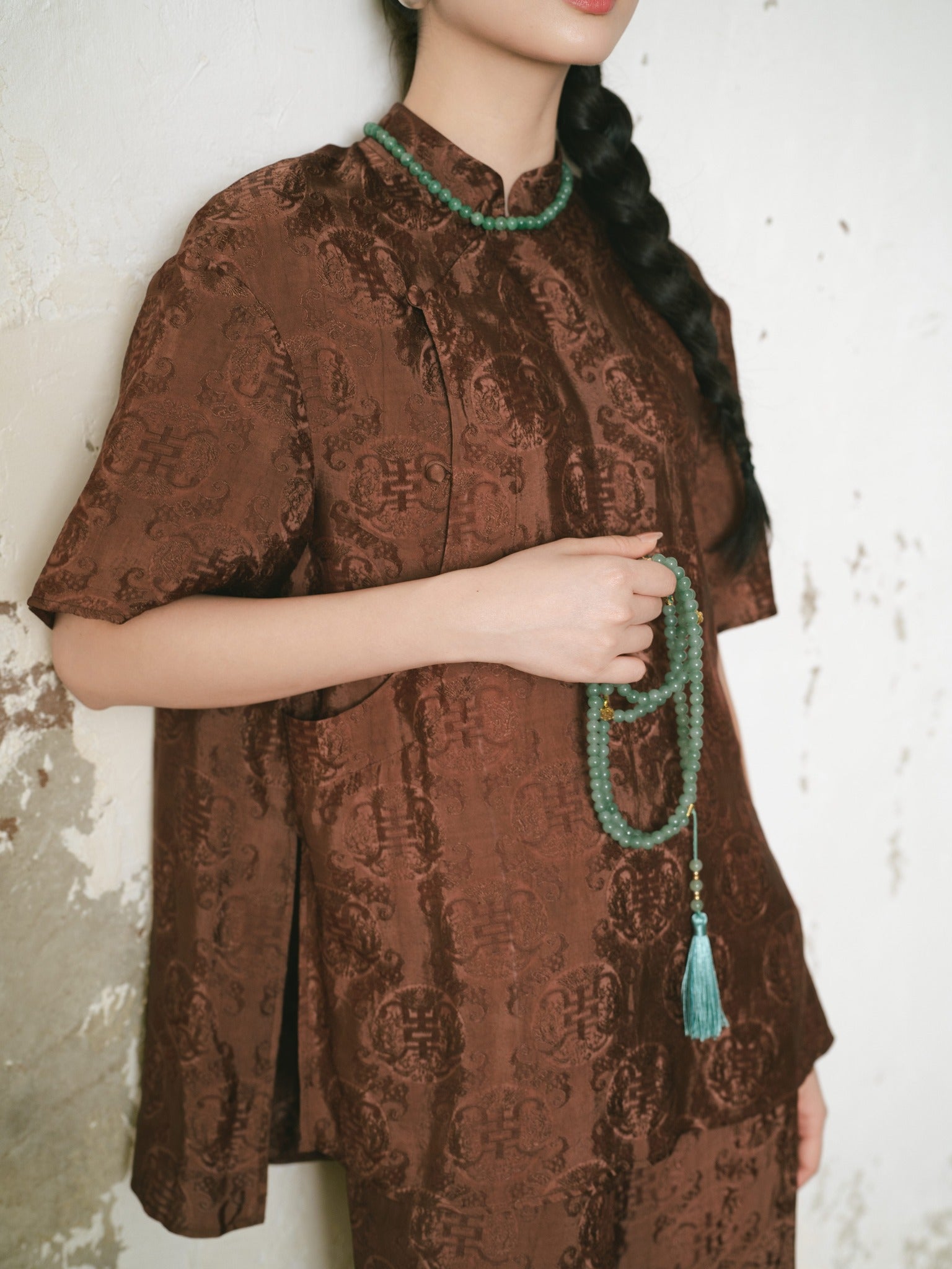 Traditional Motif - Ninh Van Set - Mandarin-neck Wormsilk in Earth Brown - side profile in brocade in brown by Hy Phuong
