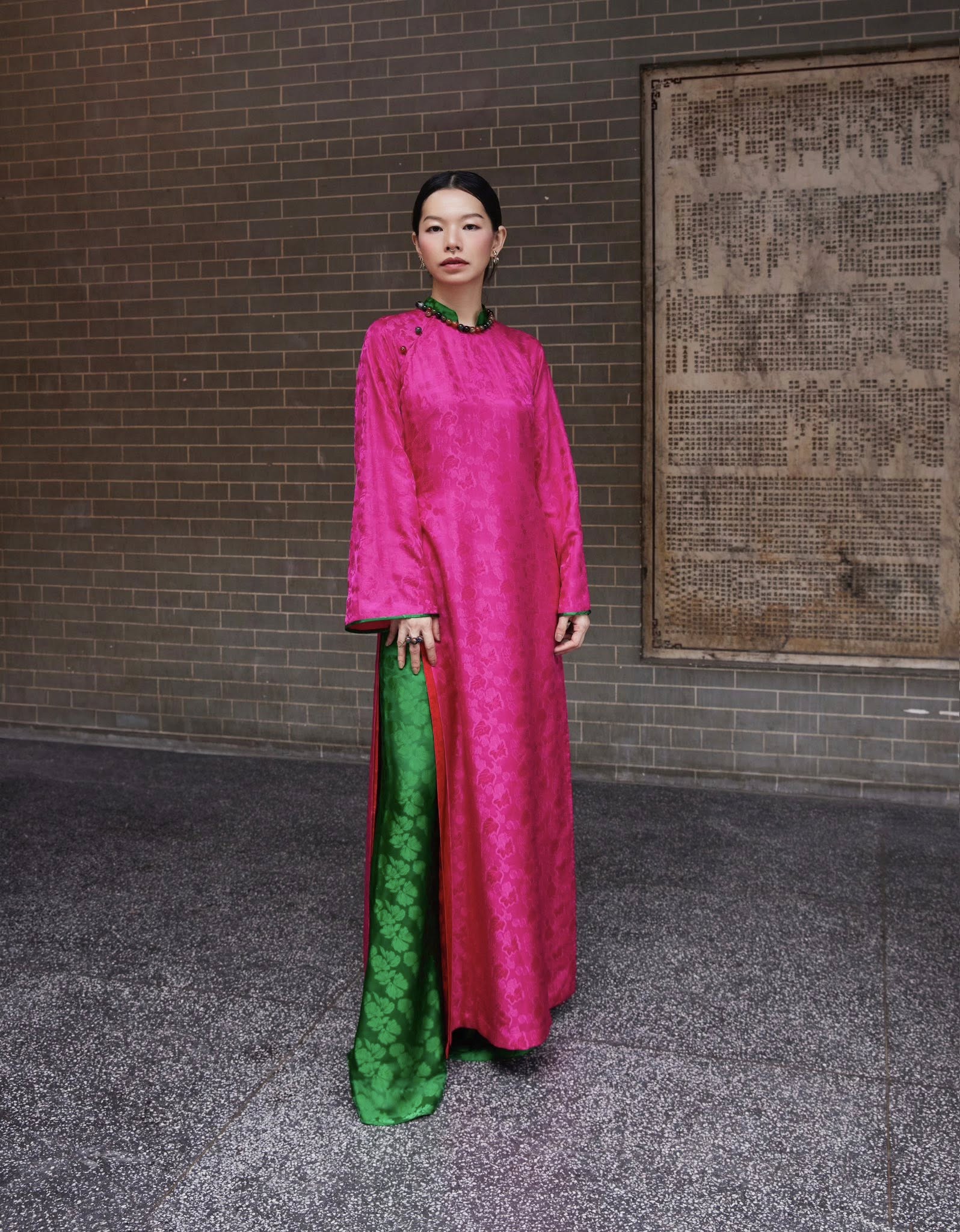 Lễ Hoa – Premium Silk Brocade Áo Dài in Fuchsia & Jade by Lo Boutique - side view highlighting elegant silhouette and luxury fabric, premium Vietnamese wormsilk clothing