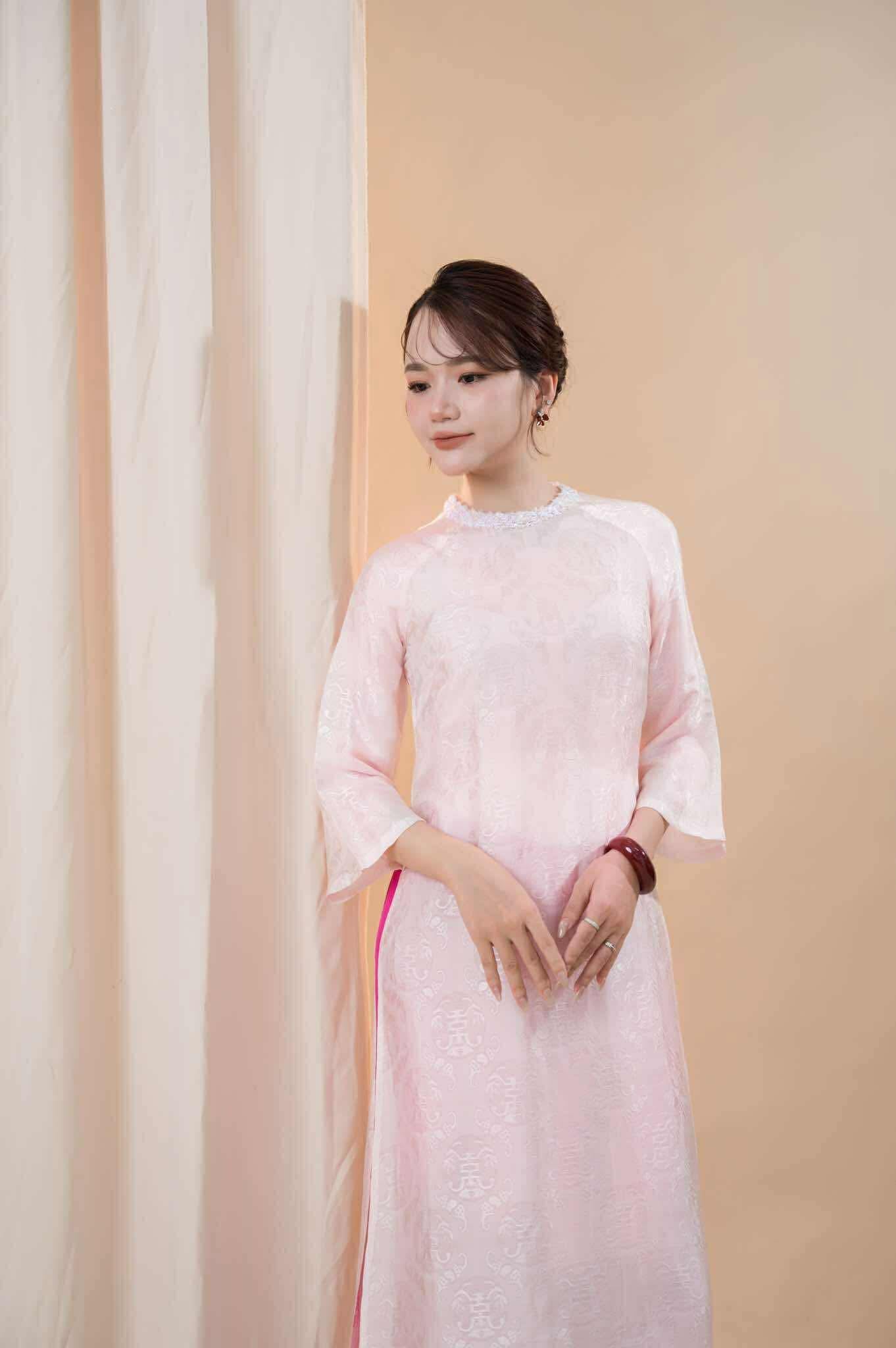 Modern Vietnamese Ao Dai "Hong Ngoc" in pink wormsilk jacquard with decorative sequined neckline