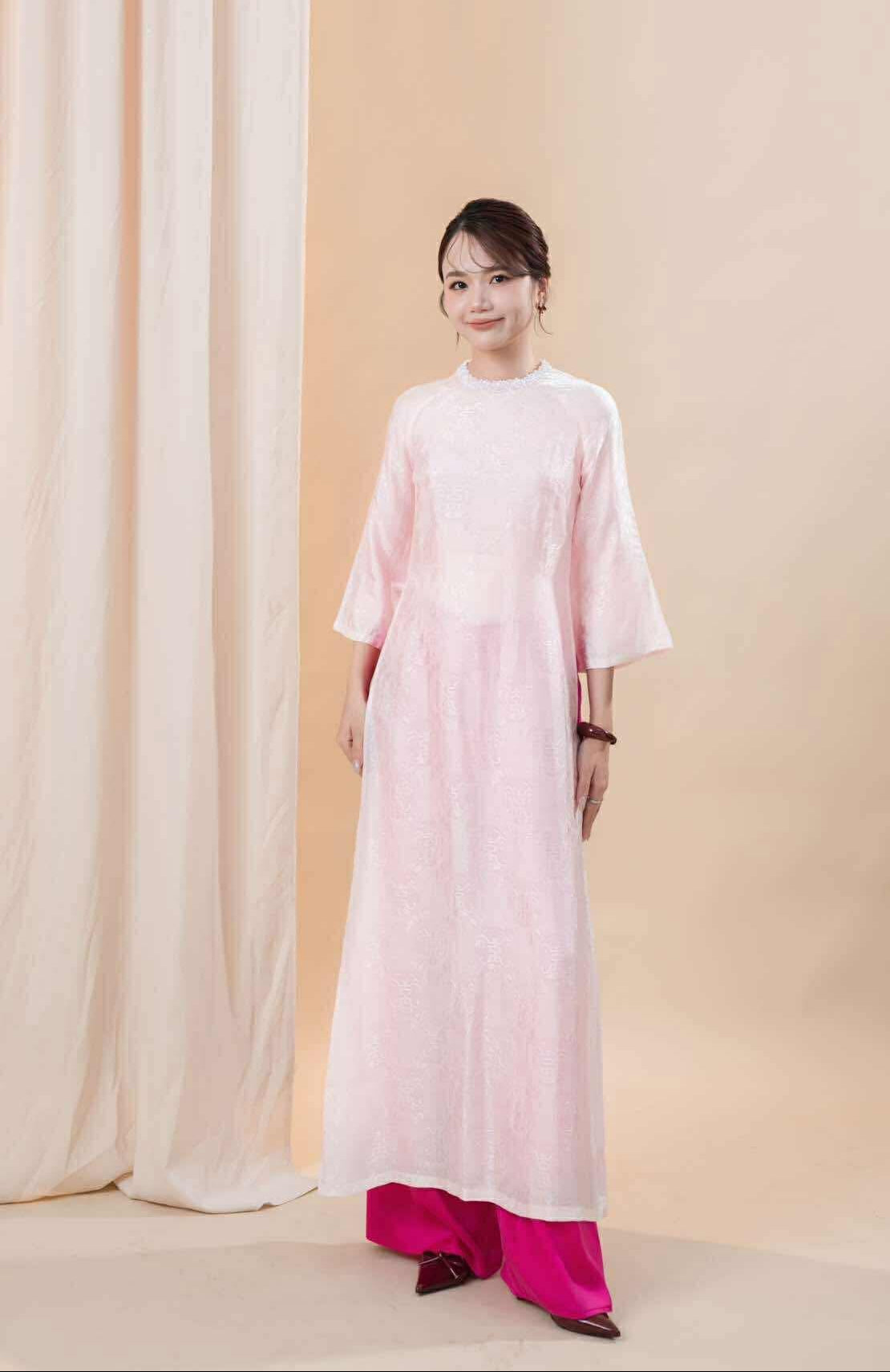 "Hong Ngoc" rosy pink wormsilk Ao Dai with hand-beaded sequin collar by Huyen Collection, elegant front view