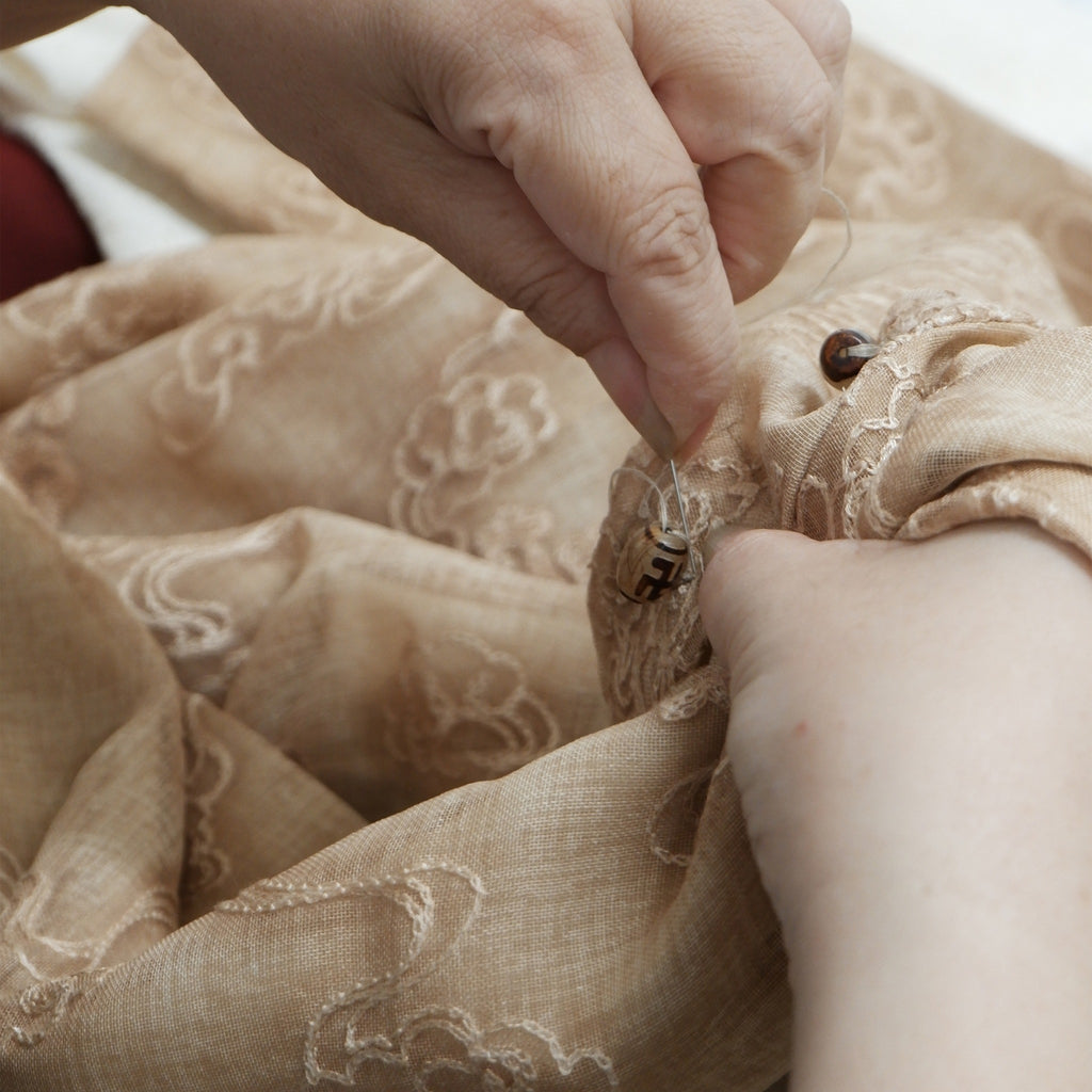 Vietnamese Embroidery - Gia Đinh Men’s Ao-dai - Embroidered Silk Áo Dài - detail close-up in beige by Maison LONG