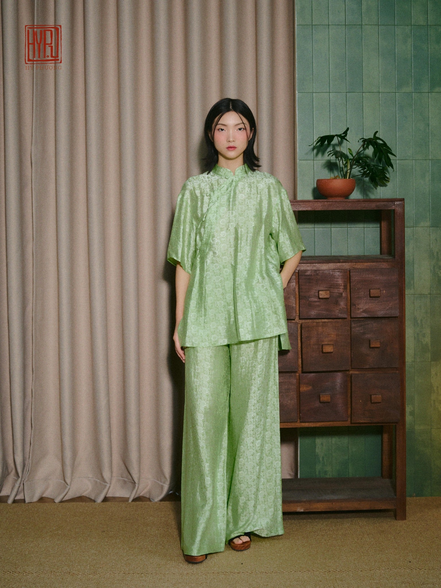 Vietnamese Ao Dai - Ninh Van Set - Mandarin-neck Wormsilk in Rose & Mint - front view in light green by Hy Phuong