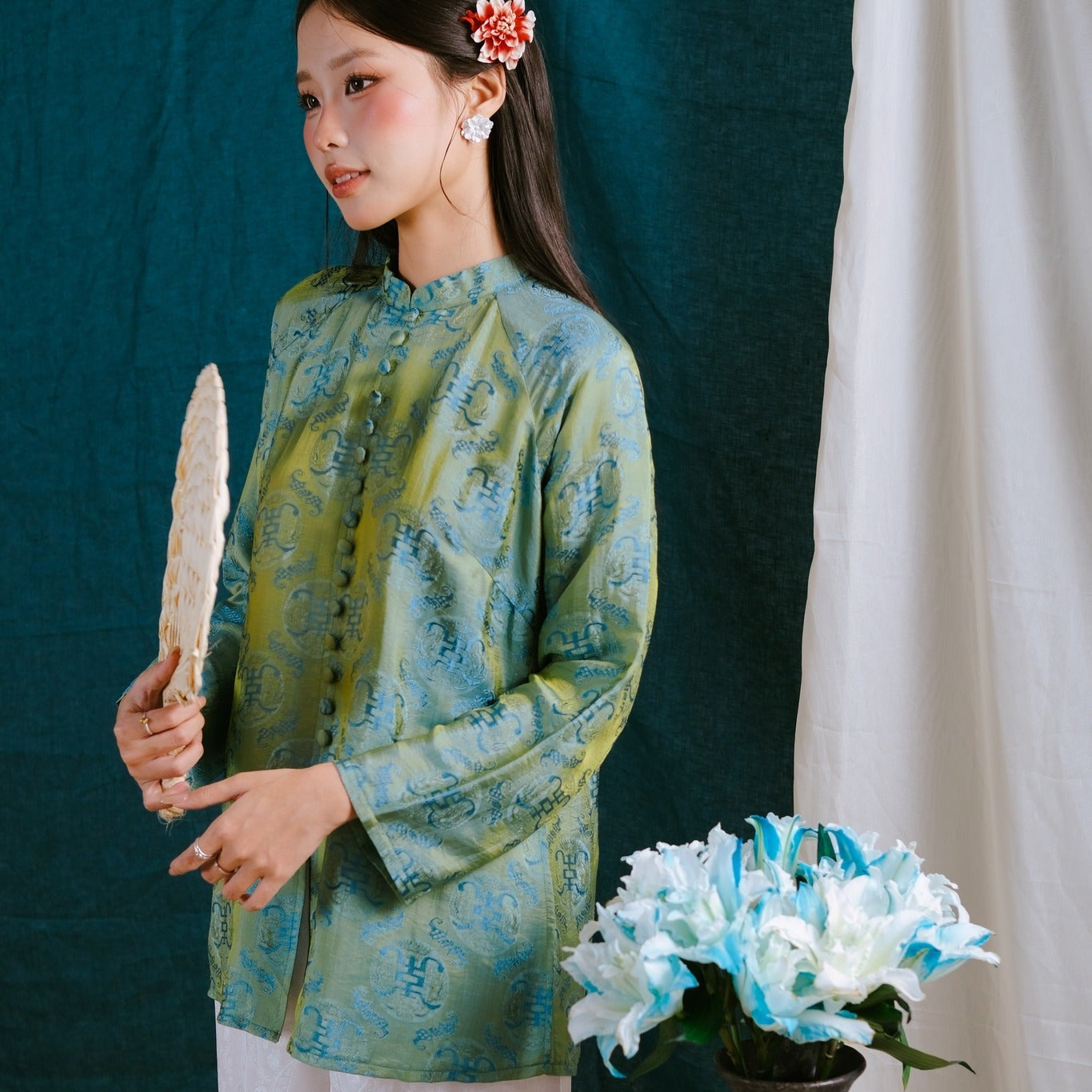 Vietnamese Ao Dai - “Luc Tra Ao Ba Ba – Wormsilk Top - front view in brocade in green by Moc