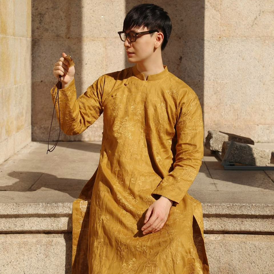 Vietnamese Ao Dai - TAM PHƯƠNG – Men’s Hand-Embroidered Linen Áo Dài - front view in silk in mustard by Maison LONG