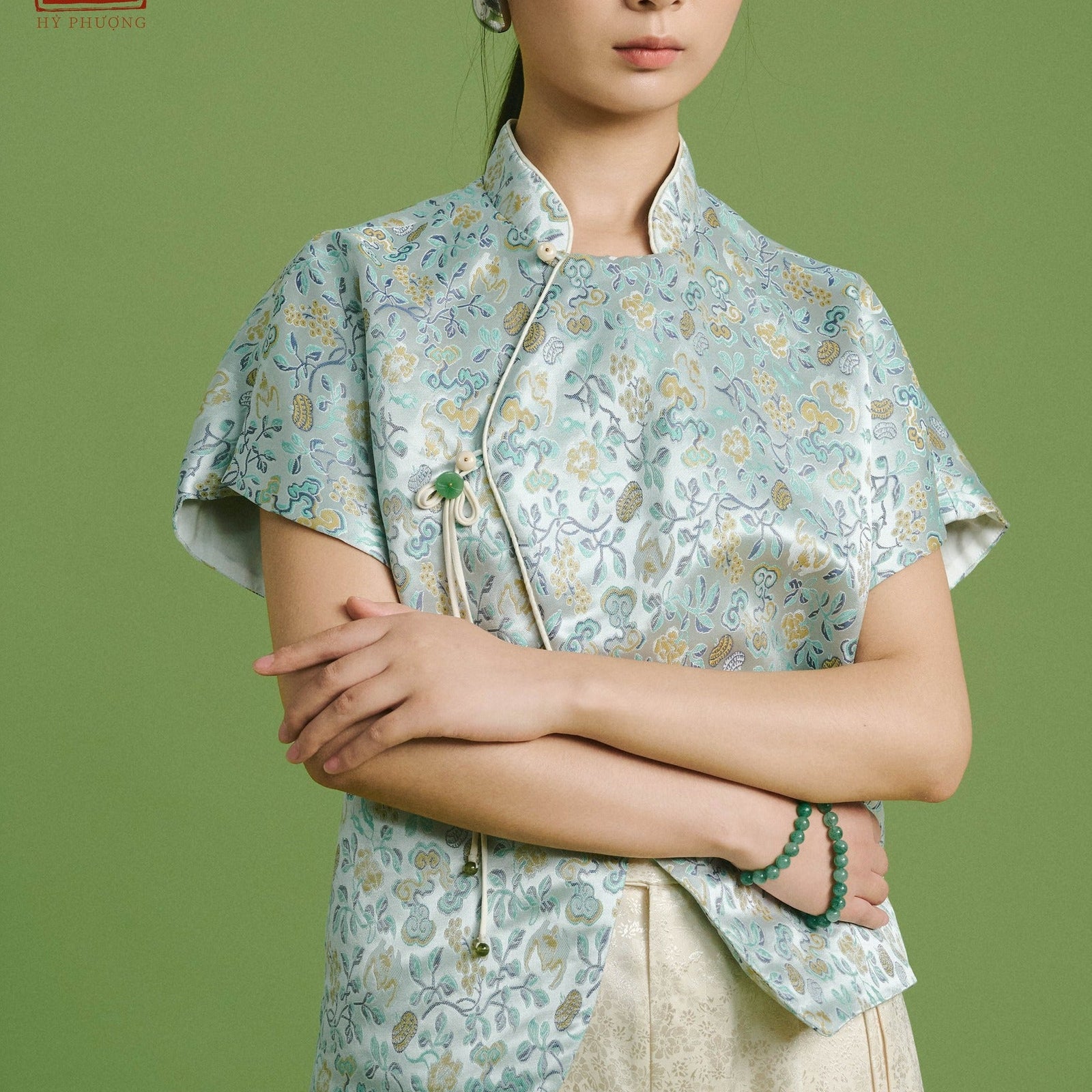 Vietnamese Silver - Spring Bloom – Embroidered Brocade Top - styled presentation in green by Hy Phuong