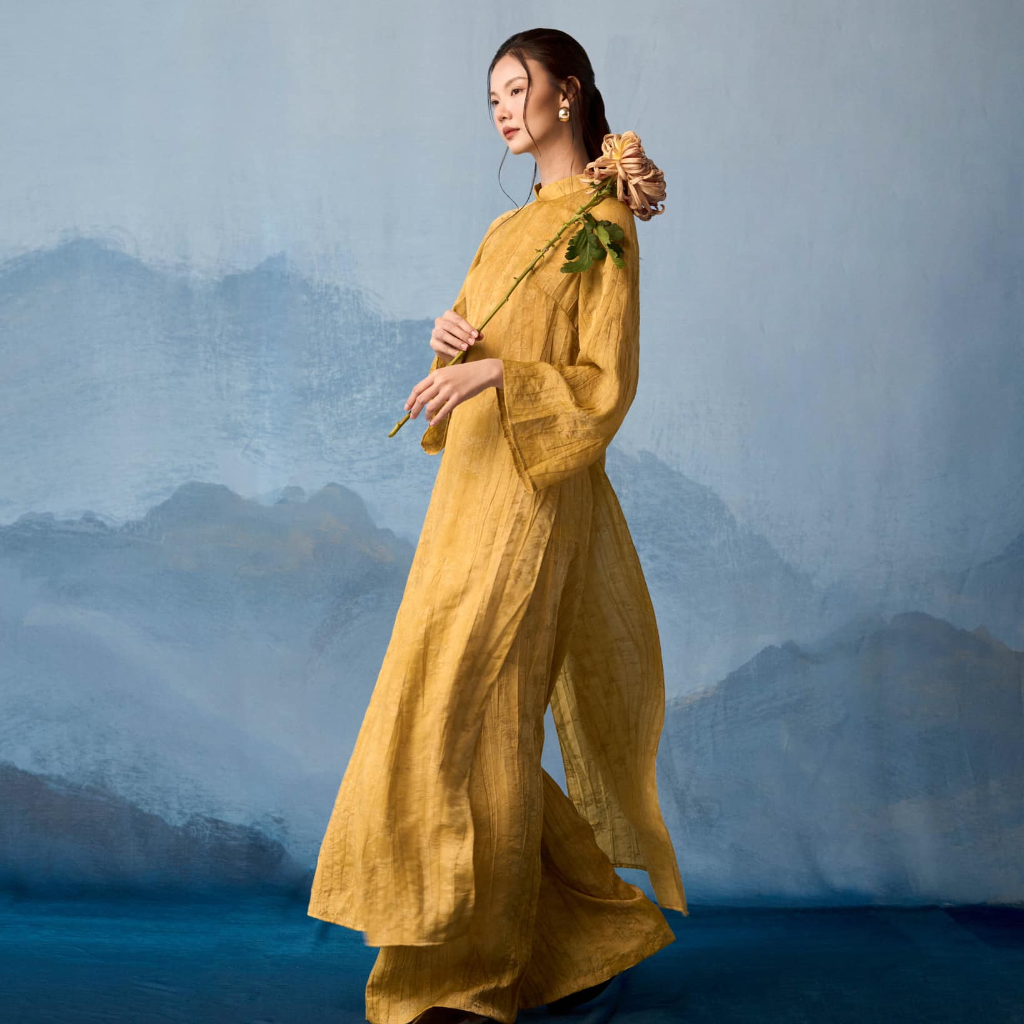 Vietnamese Ao Dai - Hoang Thu - Premium Natural Silk Ao dai Set - side profile in linen in yellow by Nam Phuong Y