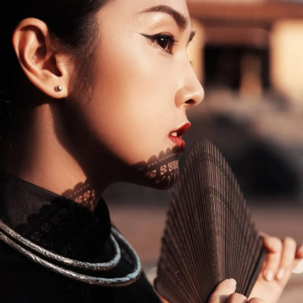 Banner image for the "Fine jewelry " section of the website (Mobile). a young girl wearing silver jewelry