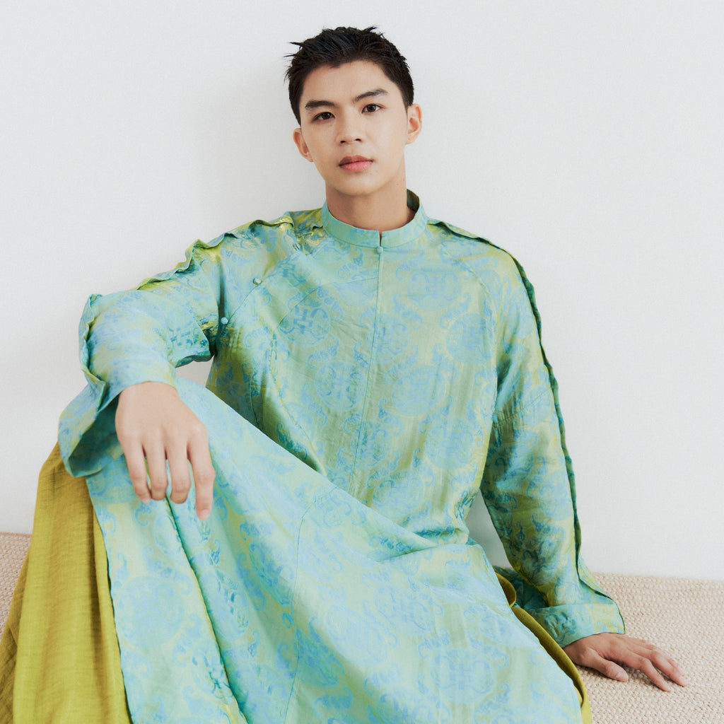 Vietnamese Ao Dai - Biec Men’s Áo Dài Set - Tencel Silk in Loc Tho pattern with raw-silk pants - front view in green by Lalin