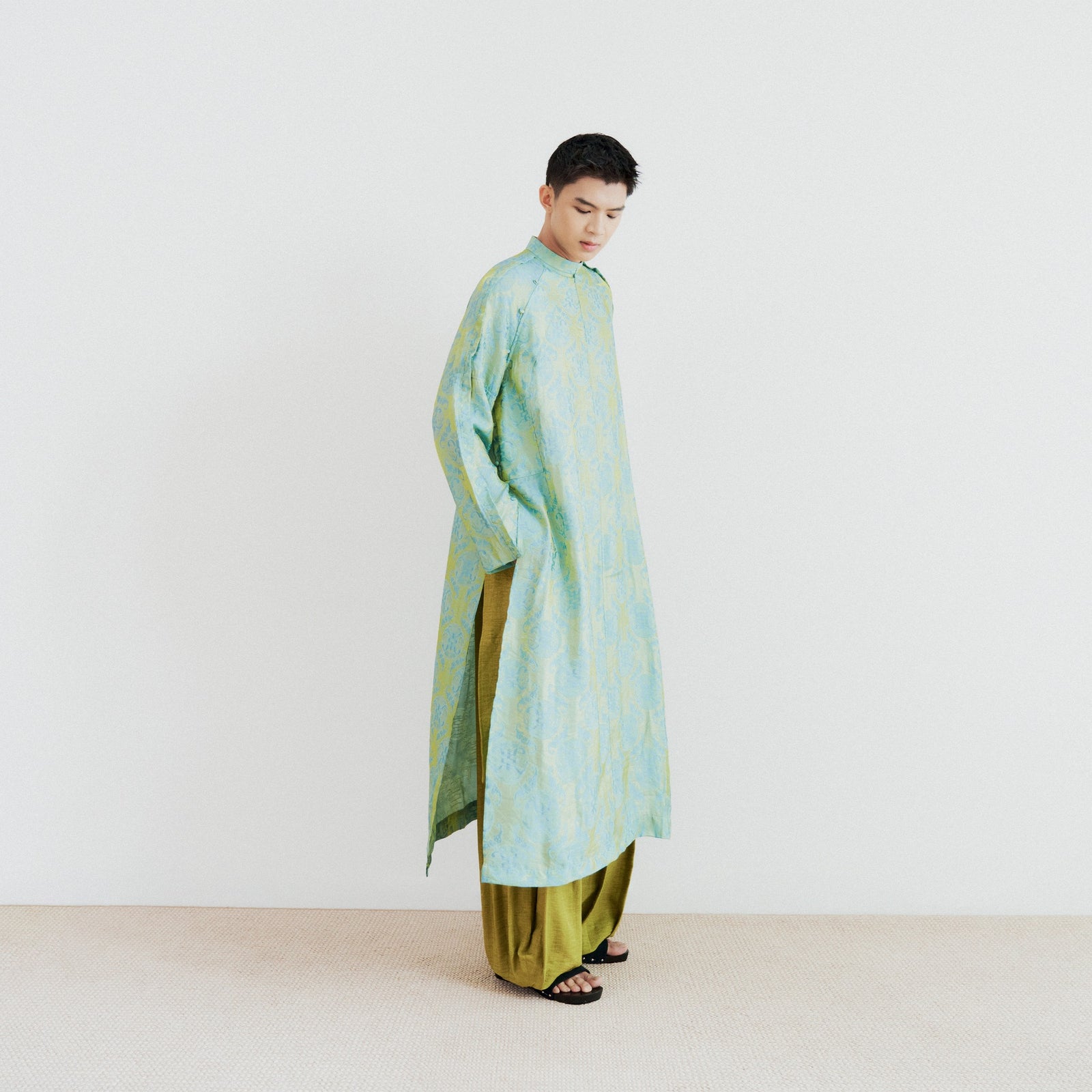 Biec Men’s Áo Dài Set - Tencel Silk in Loc Tho pattern with raw-silk pants - side profile by Lalin