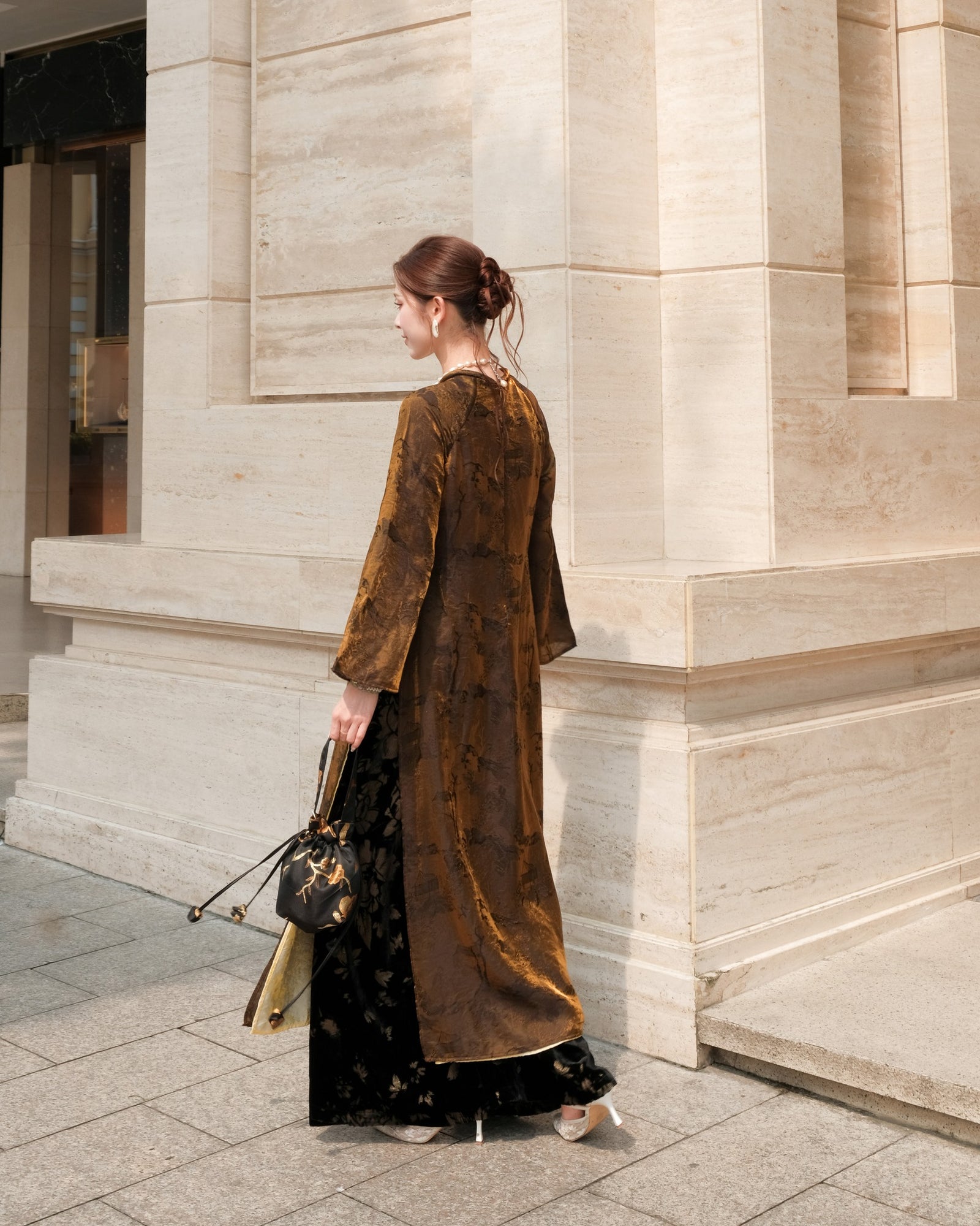 Vietnamese Ao Dai - Xuân Ba Áo Dài Set - Double-Layered Tencel with Velvet Embroidered Pants - side profile in brown by Moc