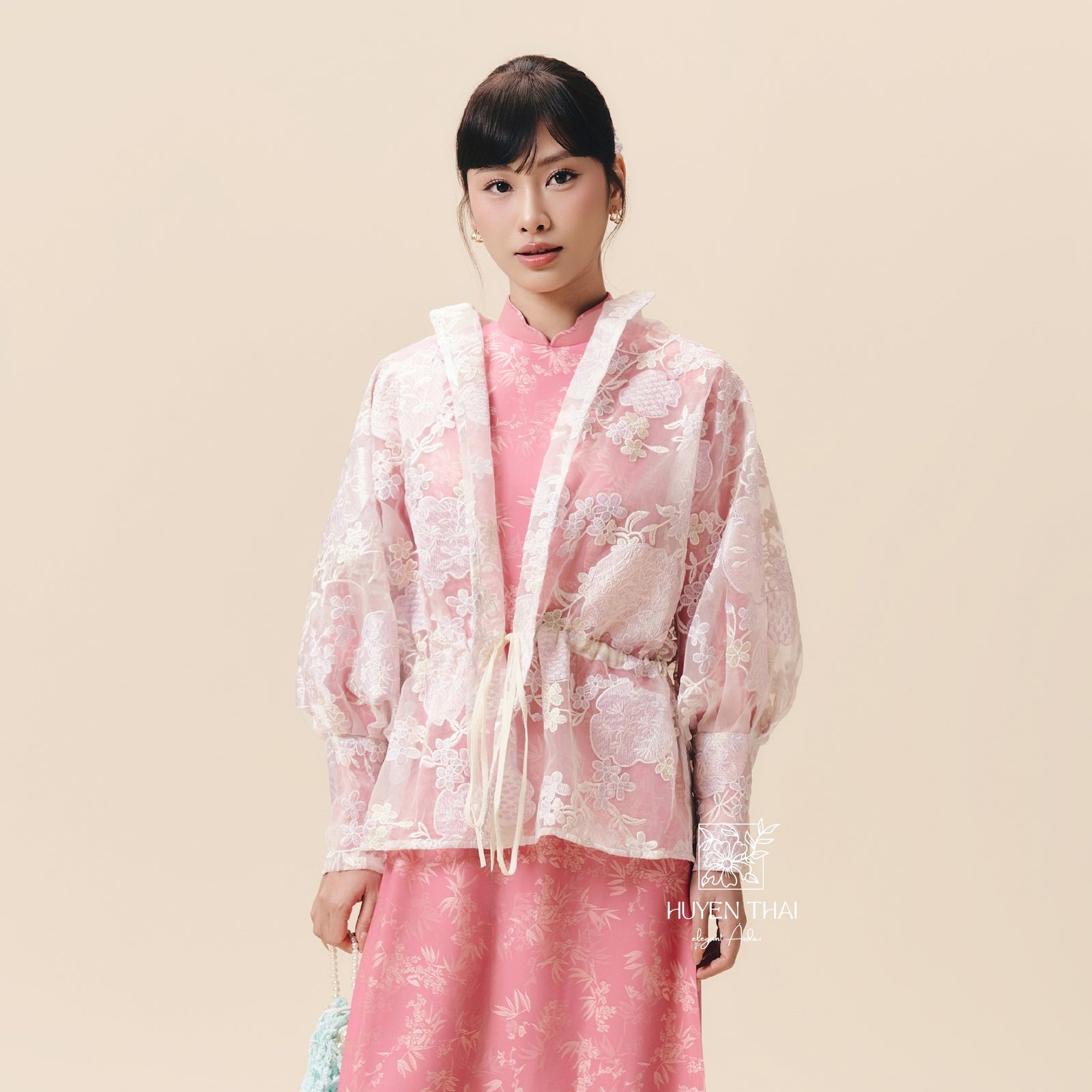 Vietnamese Ao Dai - CẦM Cardigan – Embroidered Lace in Light Purple - front view in organza in pink by Huyen Thai Collection
