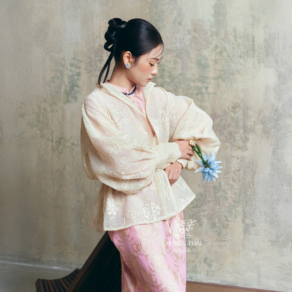 Vietnamese Ao Dai - CẦM Cardigan – Embroidered Lace in Blush Pink - side profile in silk in pink by Huyen Thai Collection