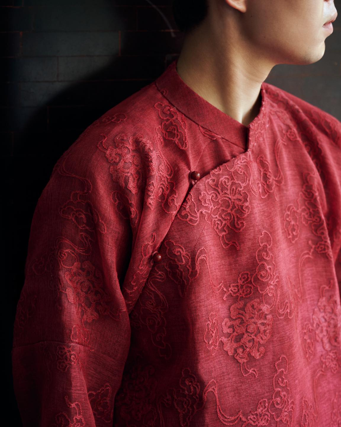 Vietnamese Embroidery - Gia Đinh Men’s Ao-dai - Embroidered Silk Áo Dài - detail close-up in brocade in red by Maison LONG