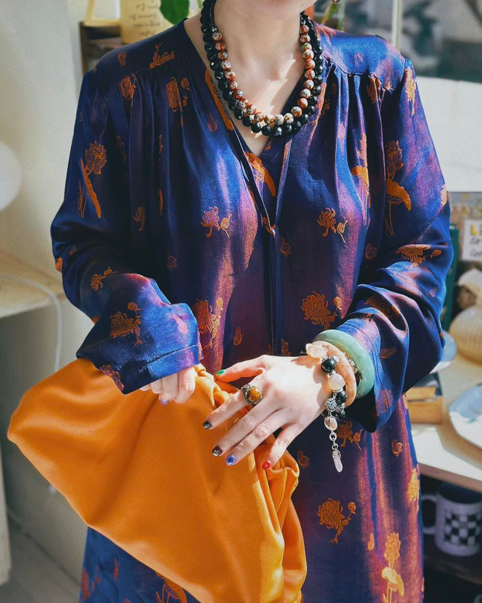 Hỷ Minh” – Designer's Natural Marble Bracelet in Midnight and Apricot - worn presentation by HI de Maison