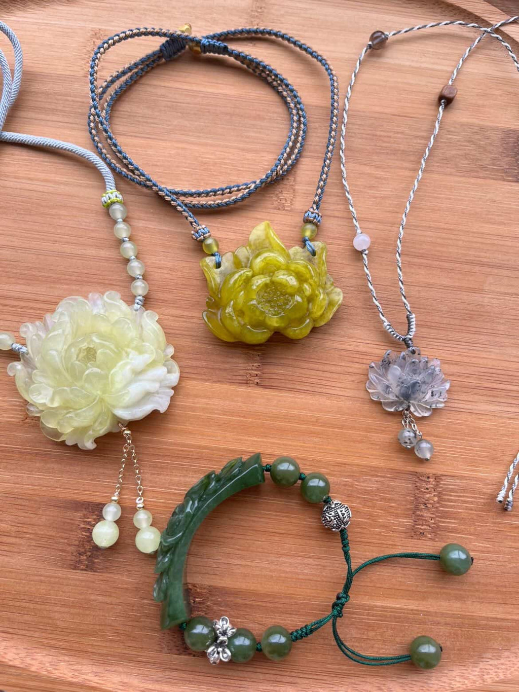 Traditional Motif - “Imperial Bloom” – Jade Bracelet with Hand-Carved Peony - flat lay display in green by L'Orient Haus