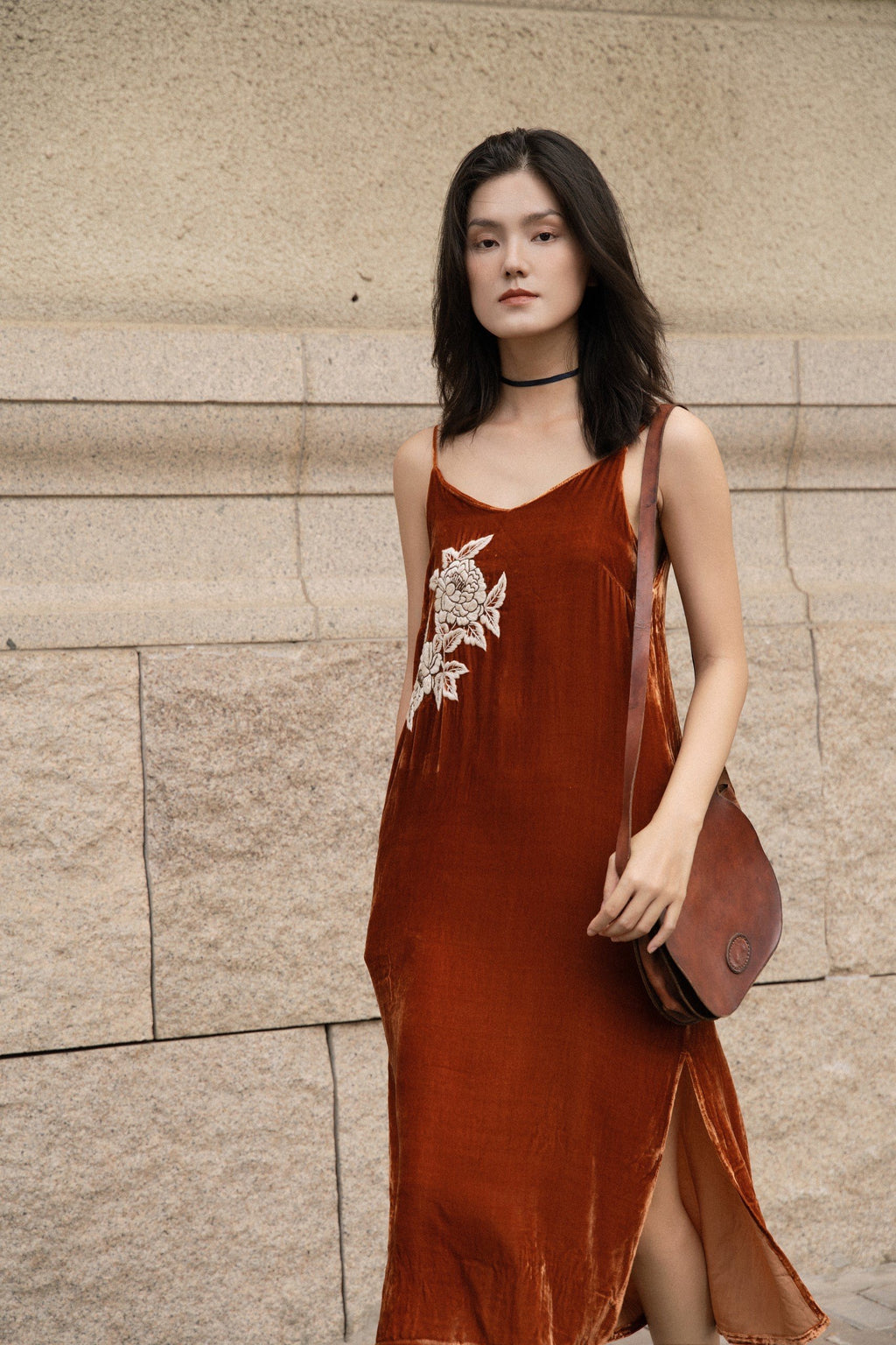"Rumi" embroidered suede tank-top dress in orange with white floral pattern by Huulala.