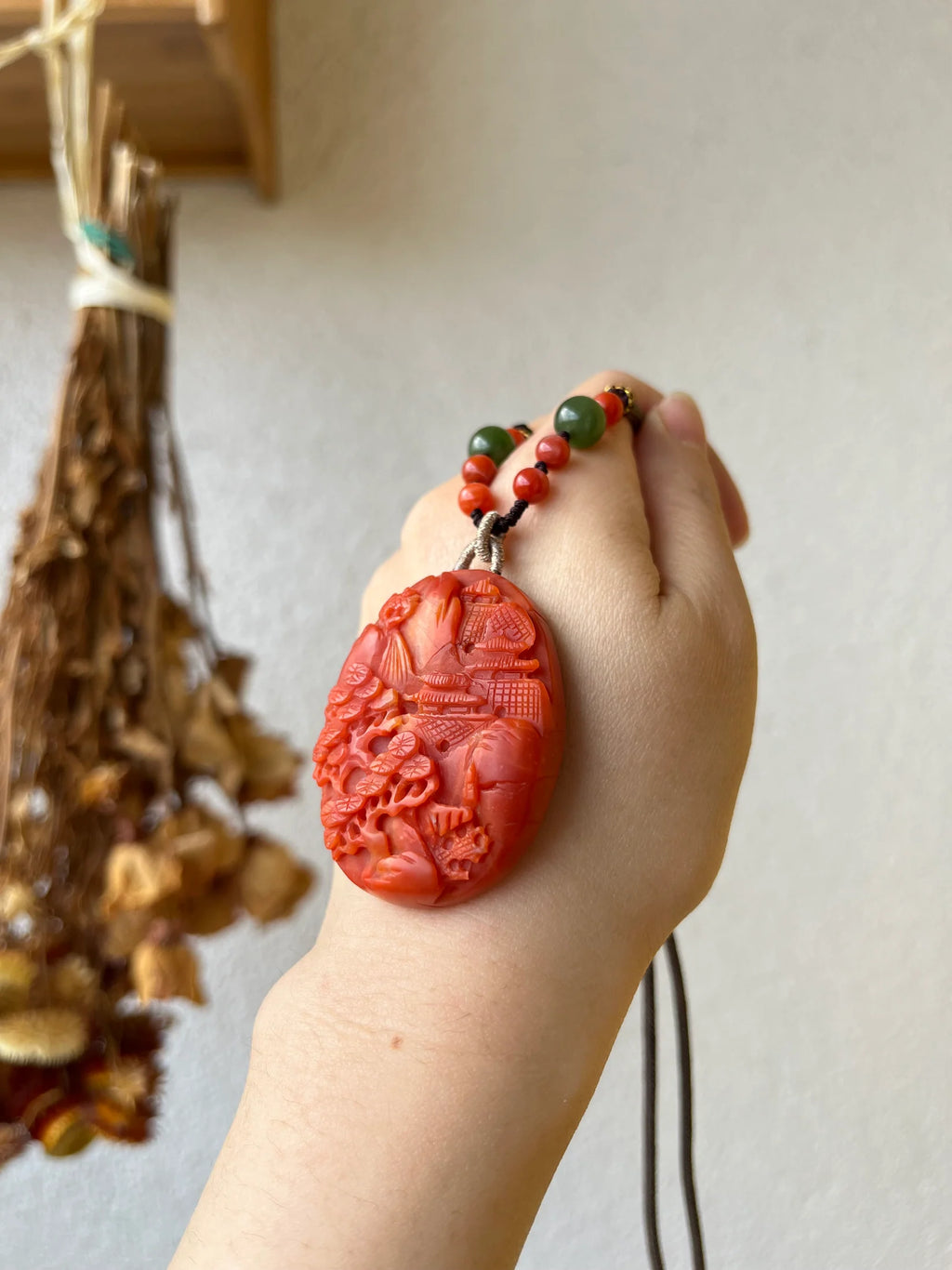 “Crimson Horizon” - Necklace with a Hand Carved Nanhong Agate Landscape Pendant, 手雕南红山水 - front view by L'Orient Haus